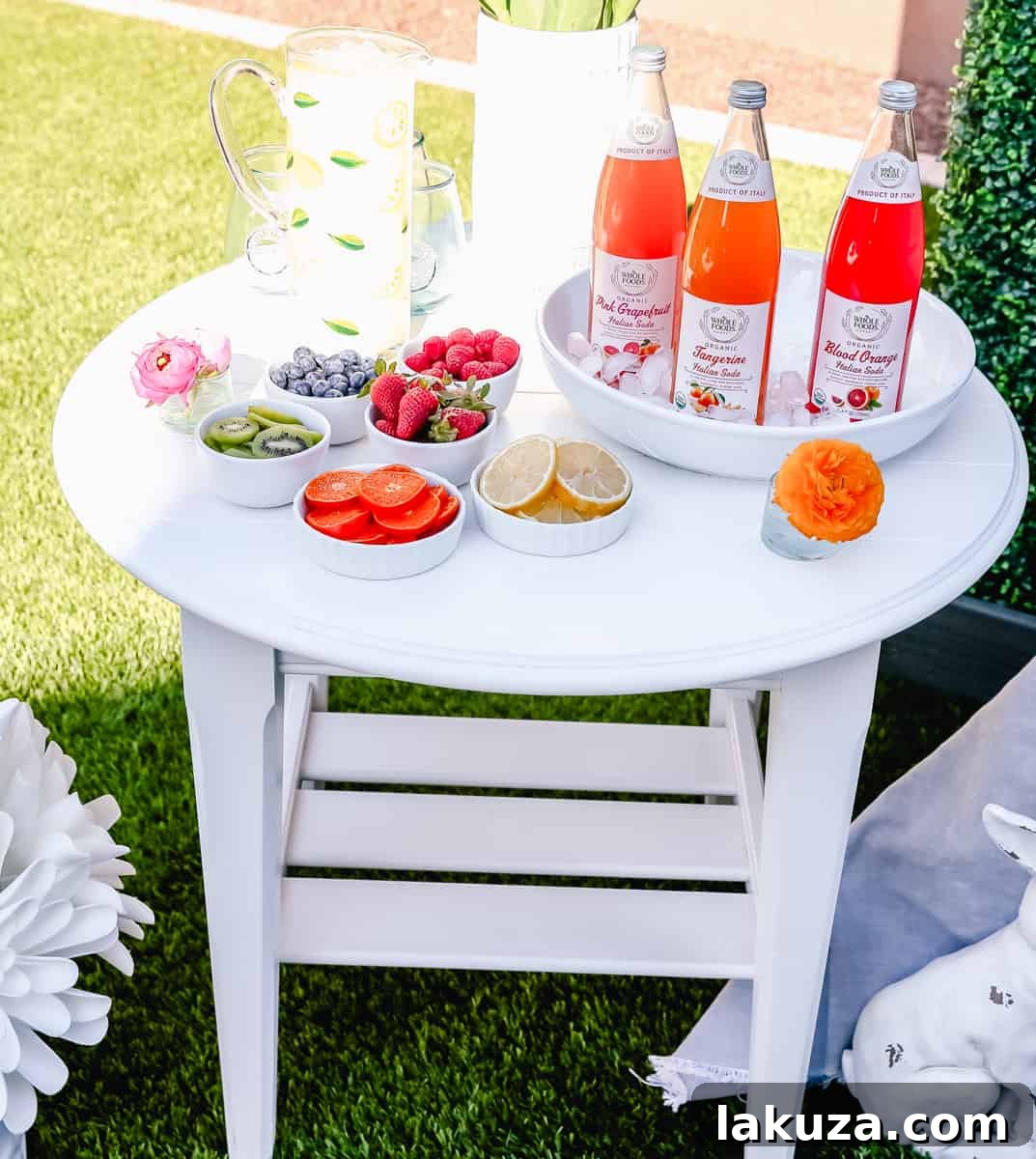 A close-up of an Italian Soda Drink Bar, highlighting the fresh fruit garnishes and refreshing beverages available. An ideal setup for a spring or Easter brunch, offering both visual appeal and delicious drinks.