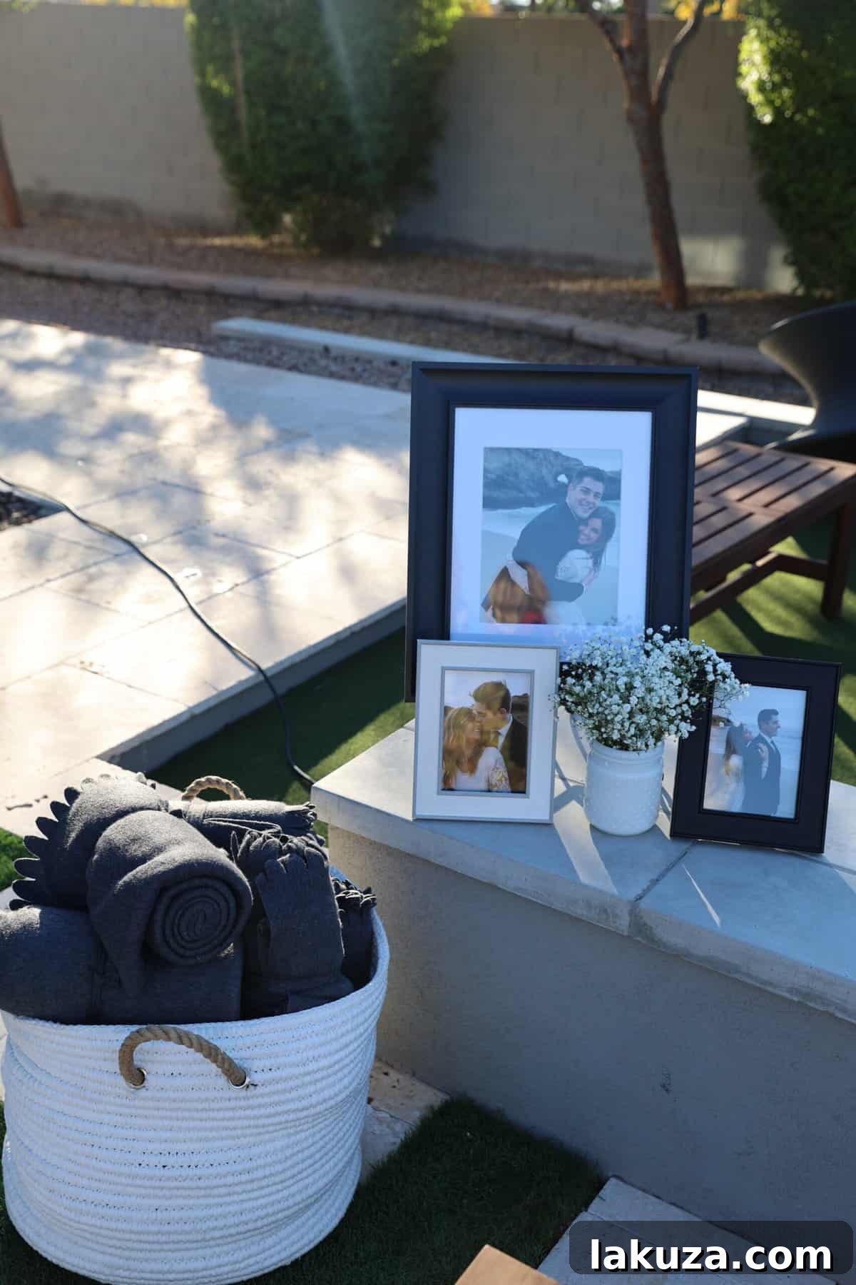 Baskets filled with cozy blankets for outdoor wedding guests