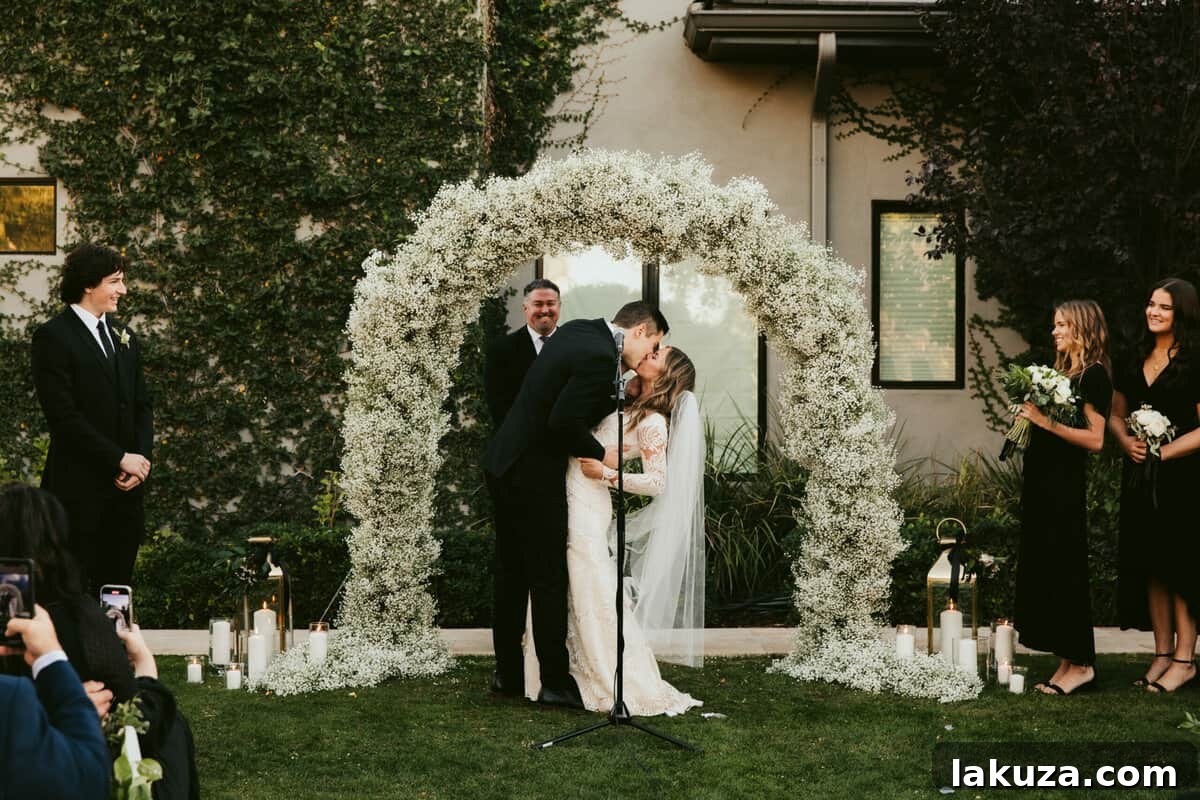 Outdoor wedding ceremony in a beautifully decorated backyard