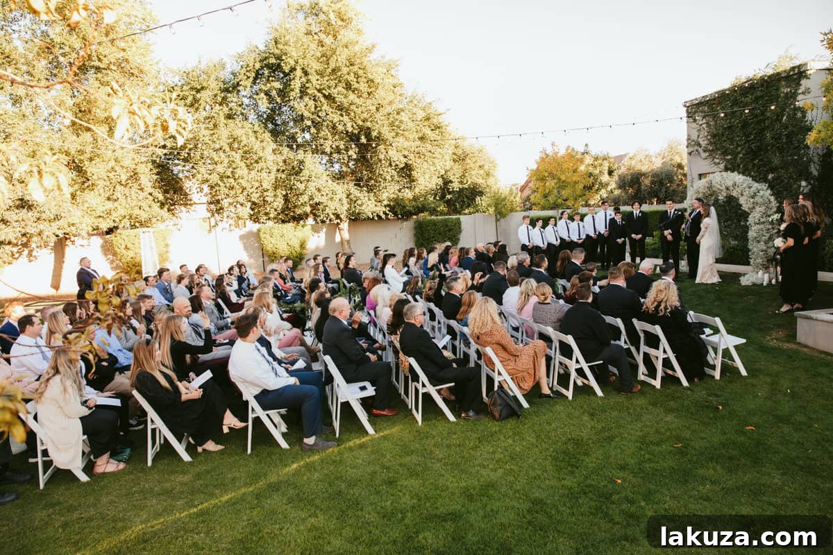 Newlyweds exchanging rings during their outdoor wedding ceremony