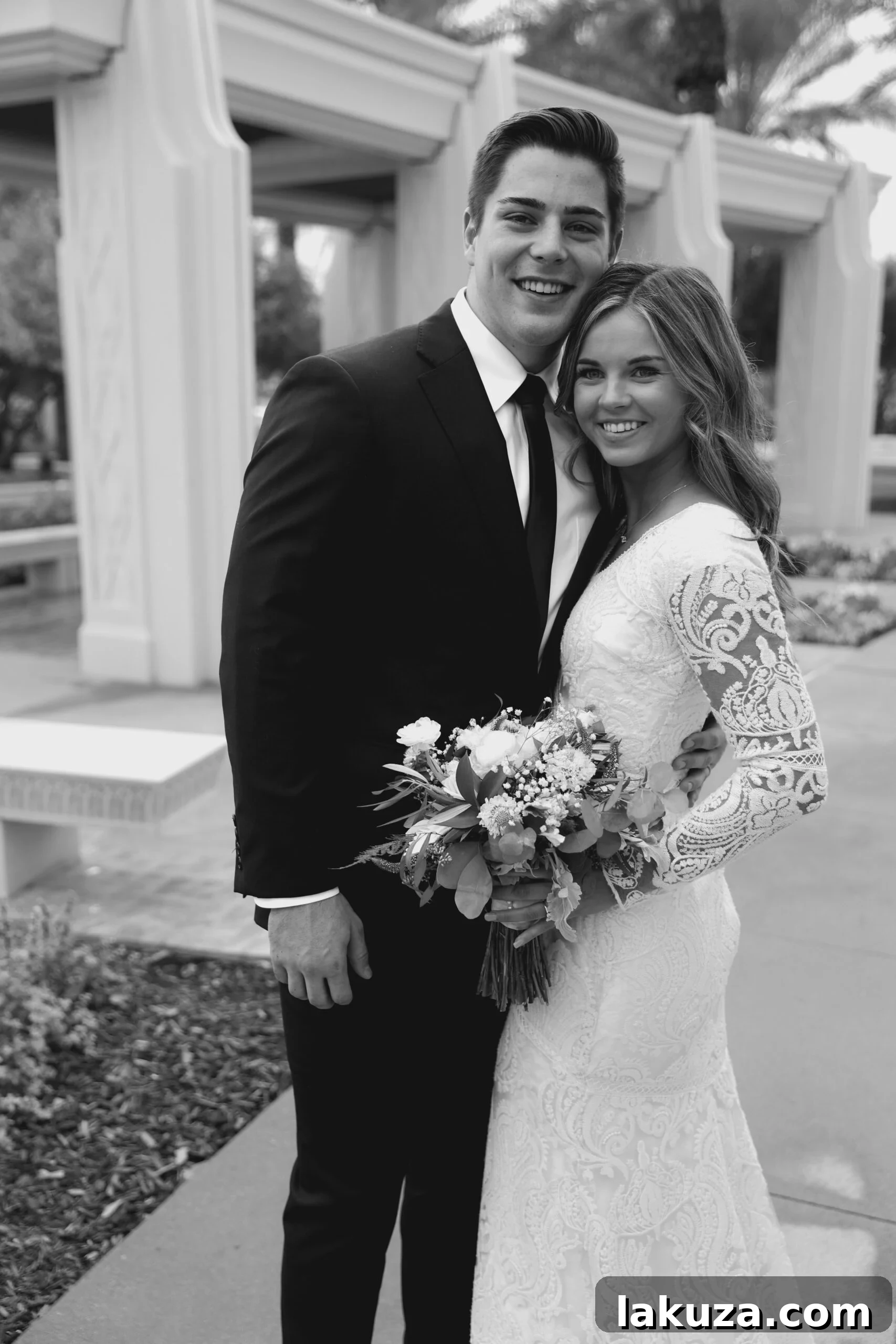 The happy couple exiting the Gilbert Arizona Temple with family and friends