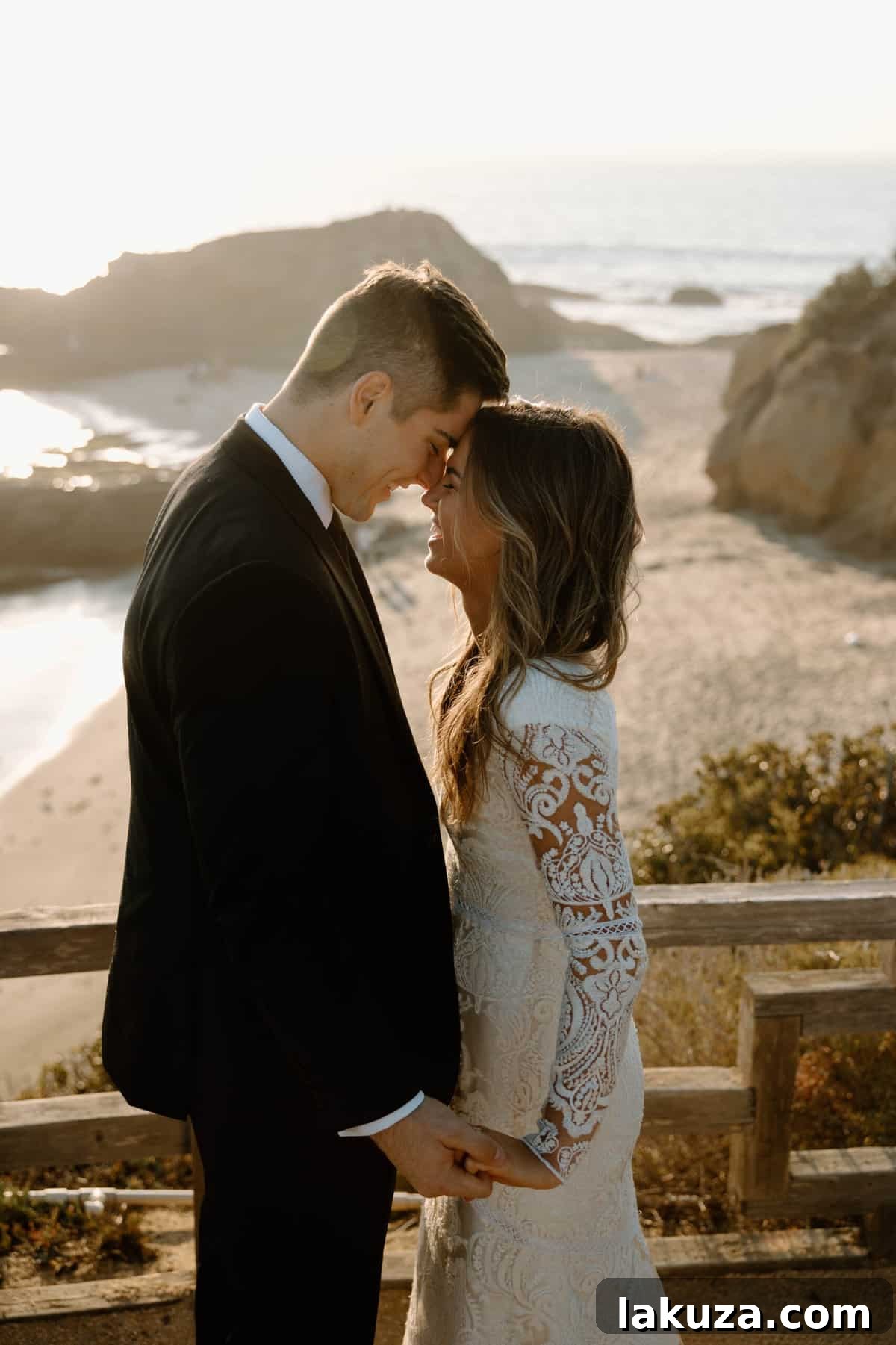Bride's flowing wedding dress on the beach