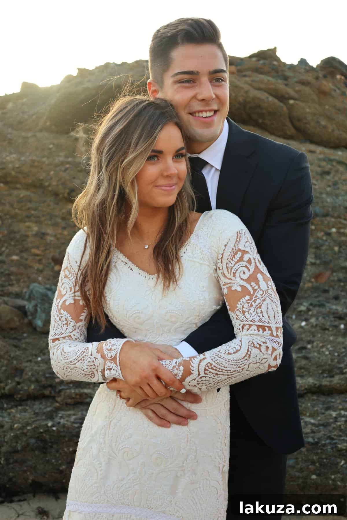 Bride's radiant smile during her beach bridal shoot
