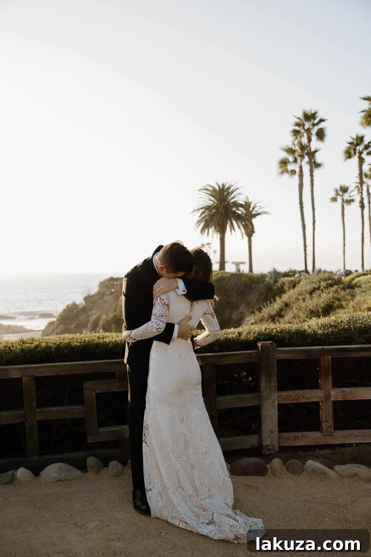 Close-up of Sierra's bridal bouquet against the ocean backdrop