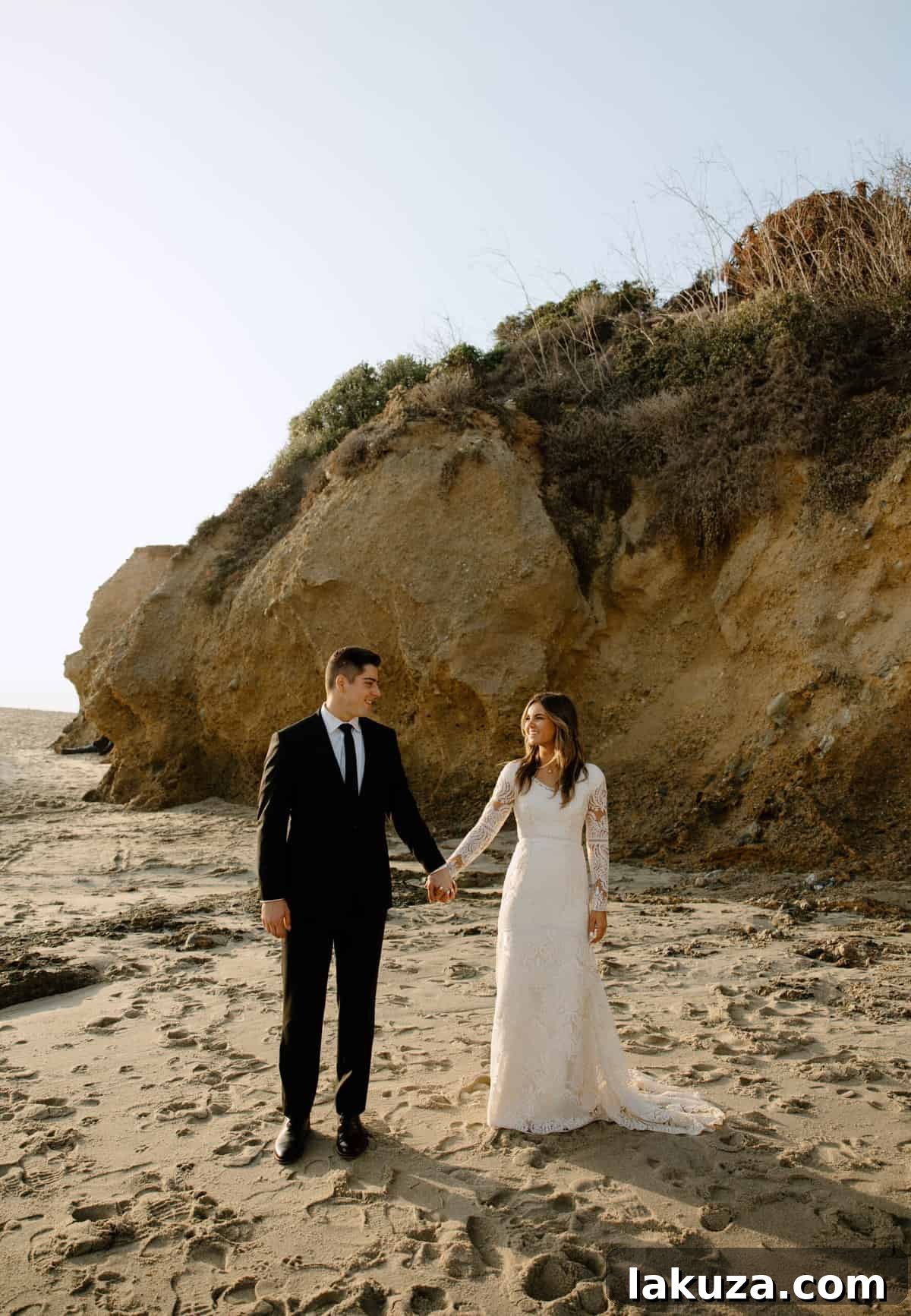 Couple looking out at the vast ocean
