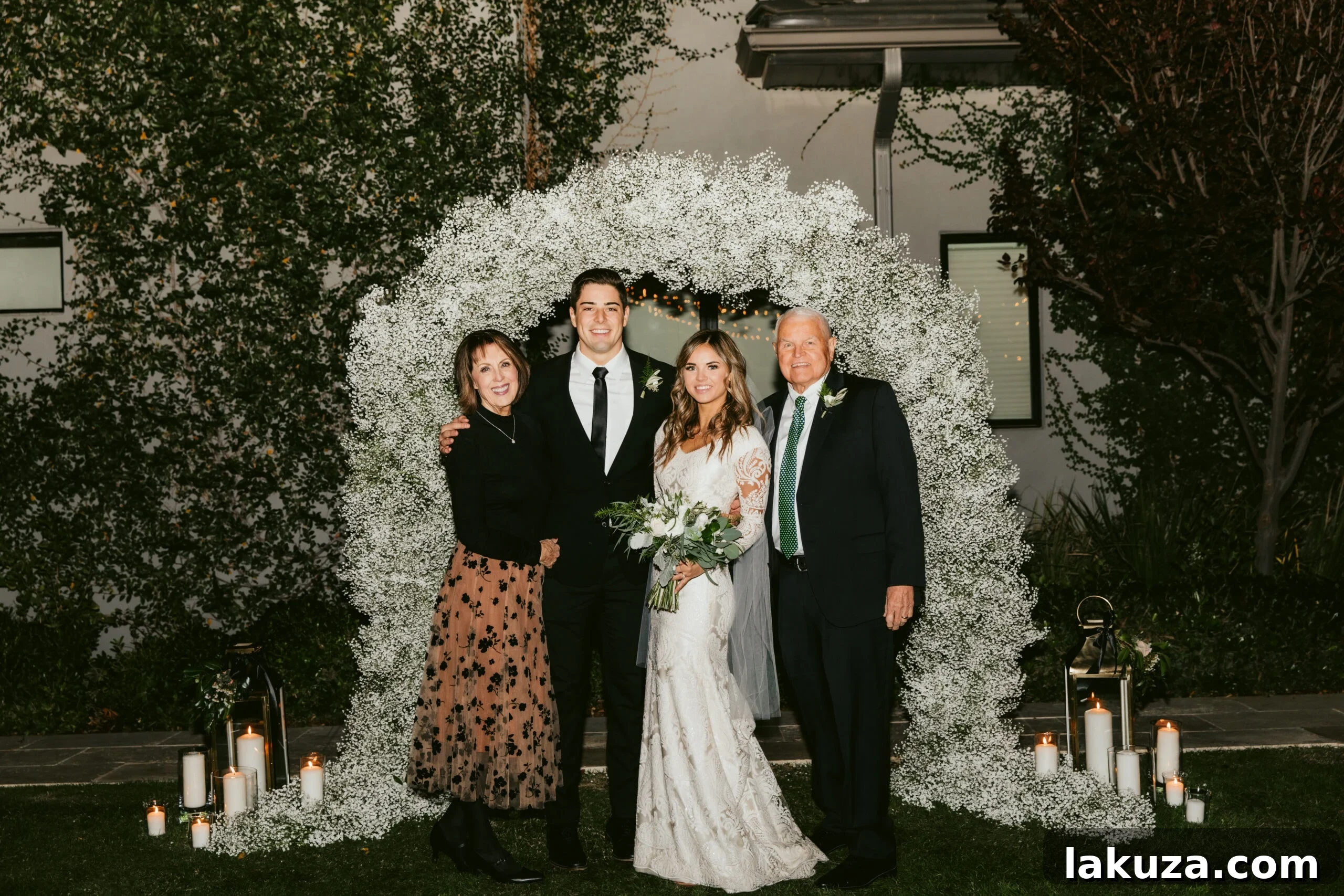 The Driggs Family posing together at the wedding reception