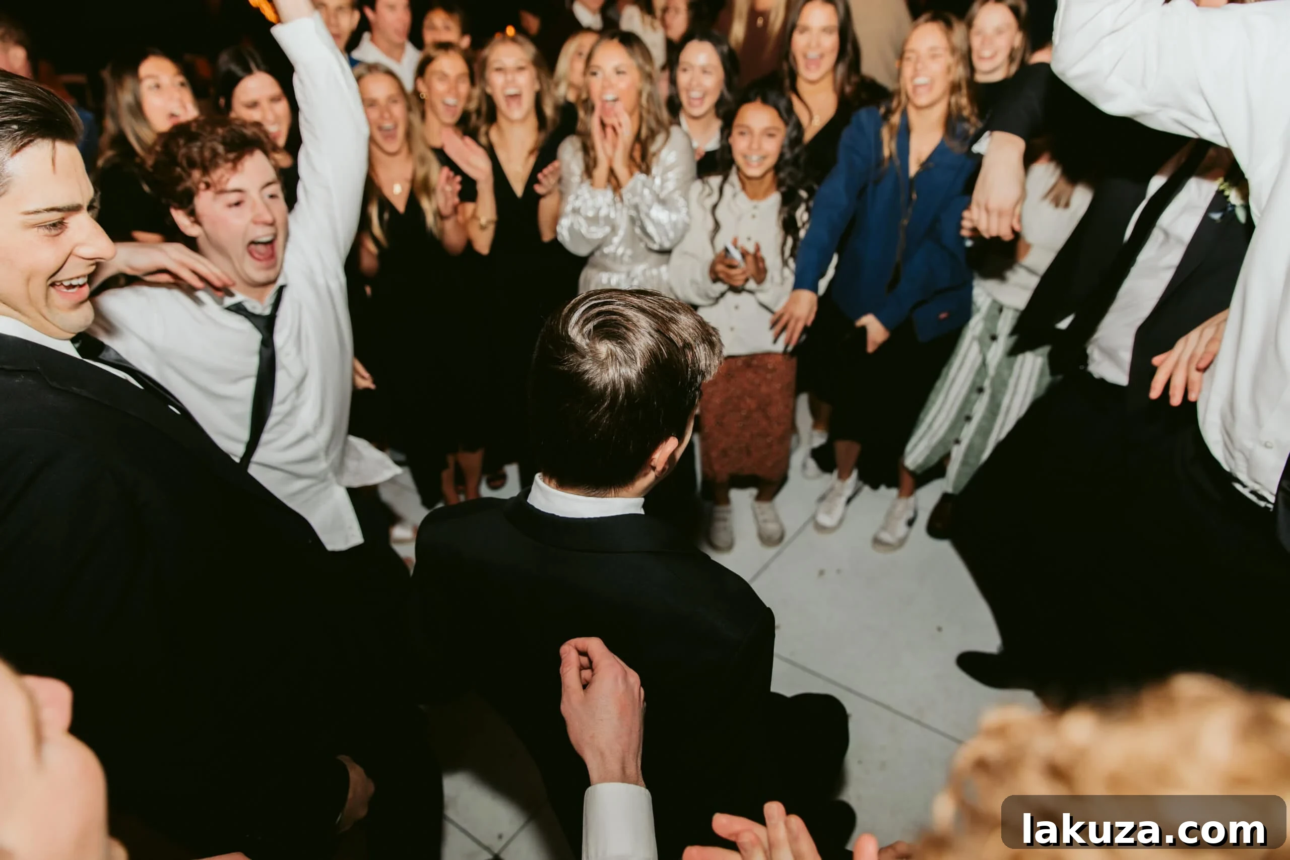 Candid shot of guests having fun at the wedding