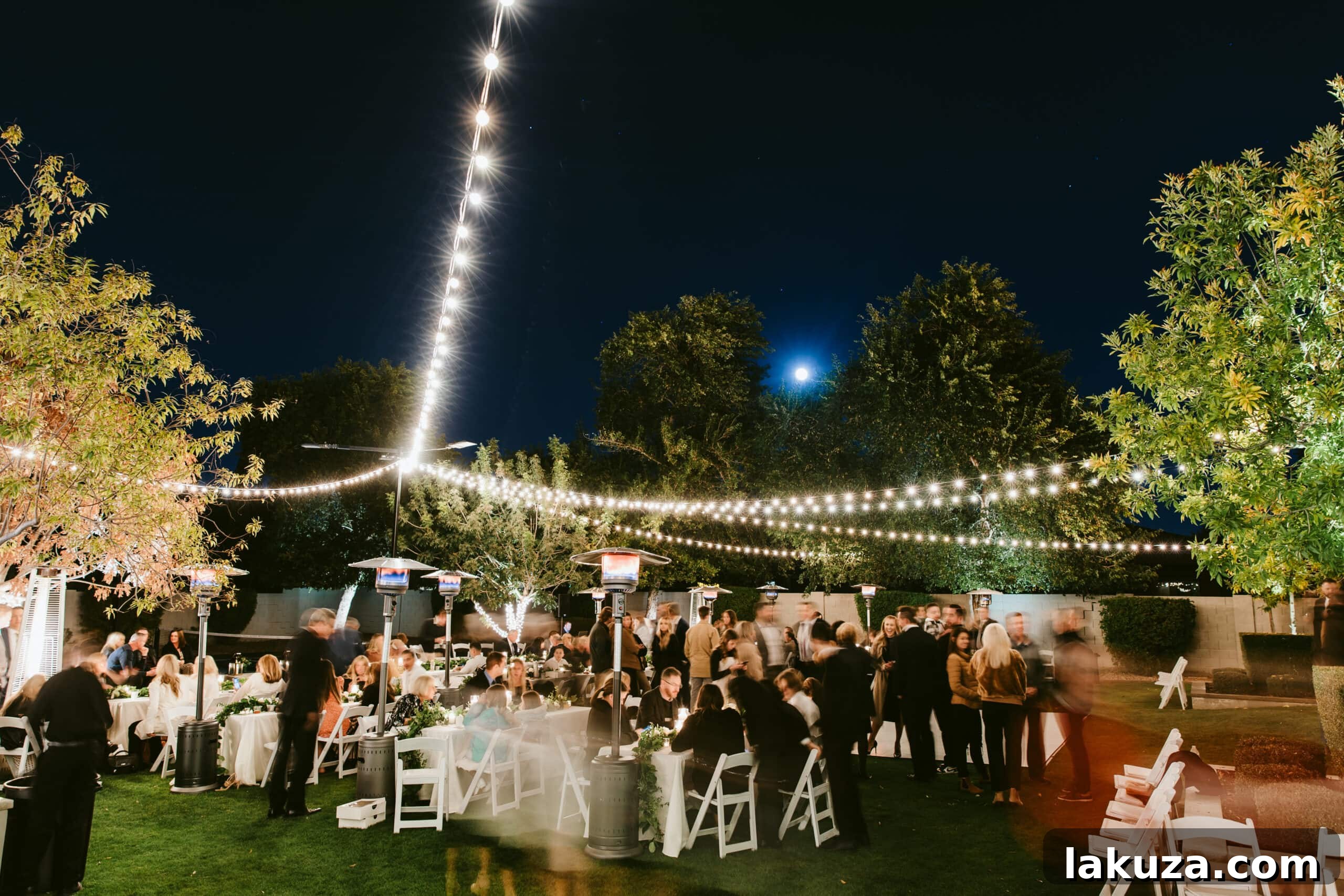 Candid shot of wedding guests enjoying the celebration