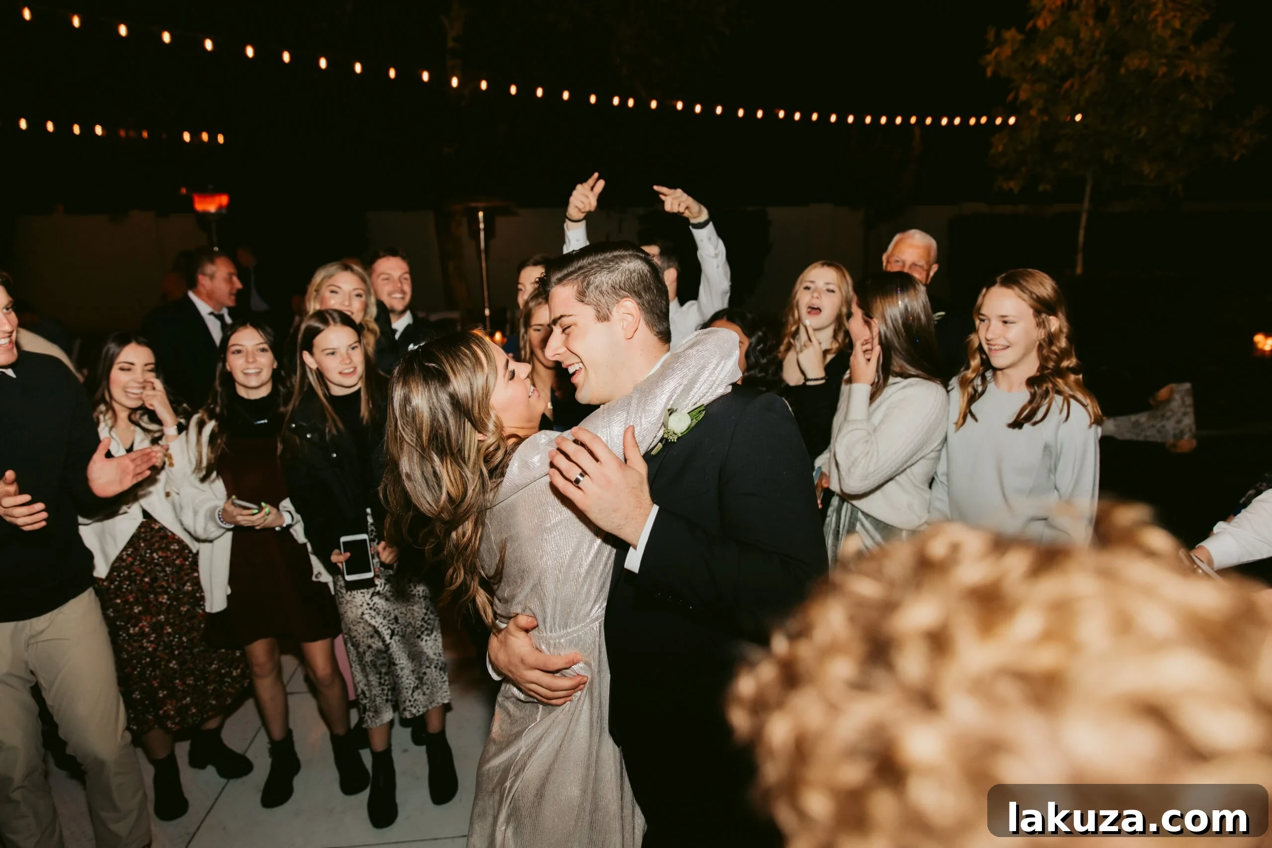 The happy couple sharing a private moment during the reception