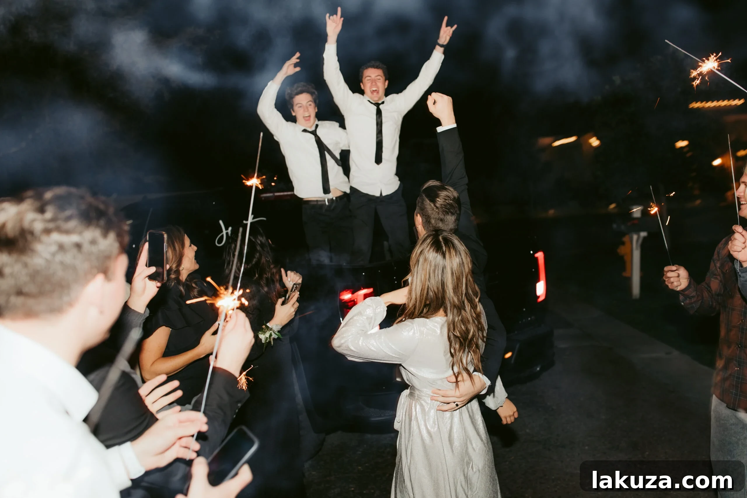 Emotional farewell as the bride and groom leave their wedding
