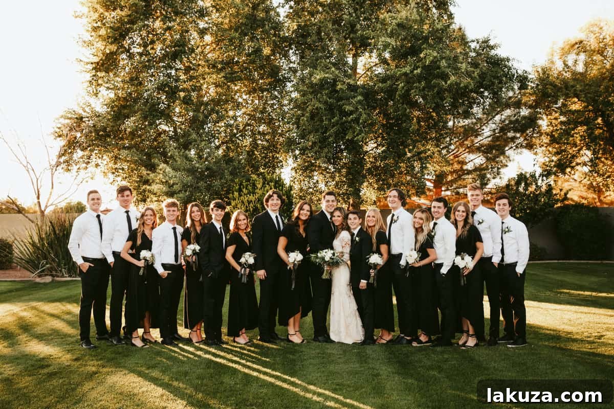 Wedding party posing together for a group photo