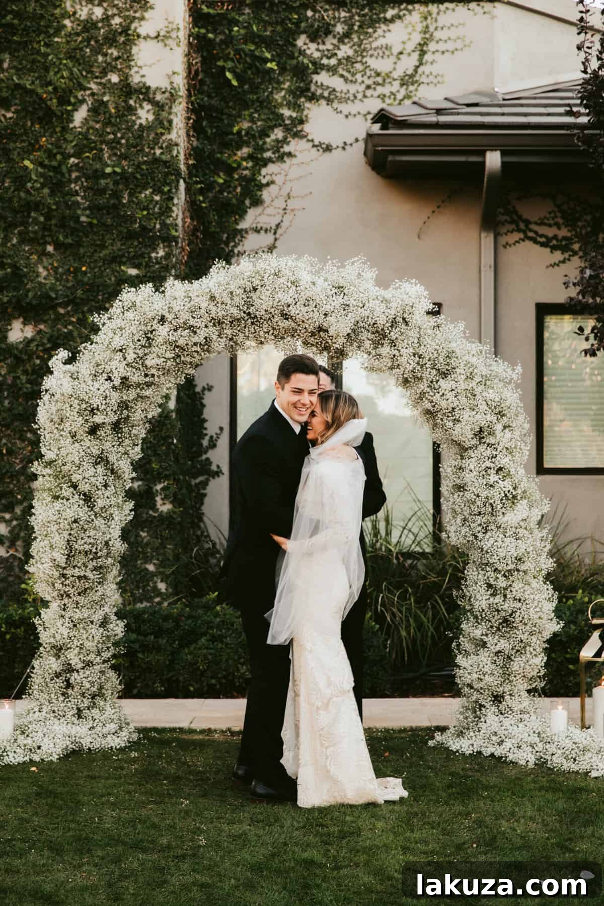 Bride and groom holding hands during the ceremony