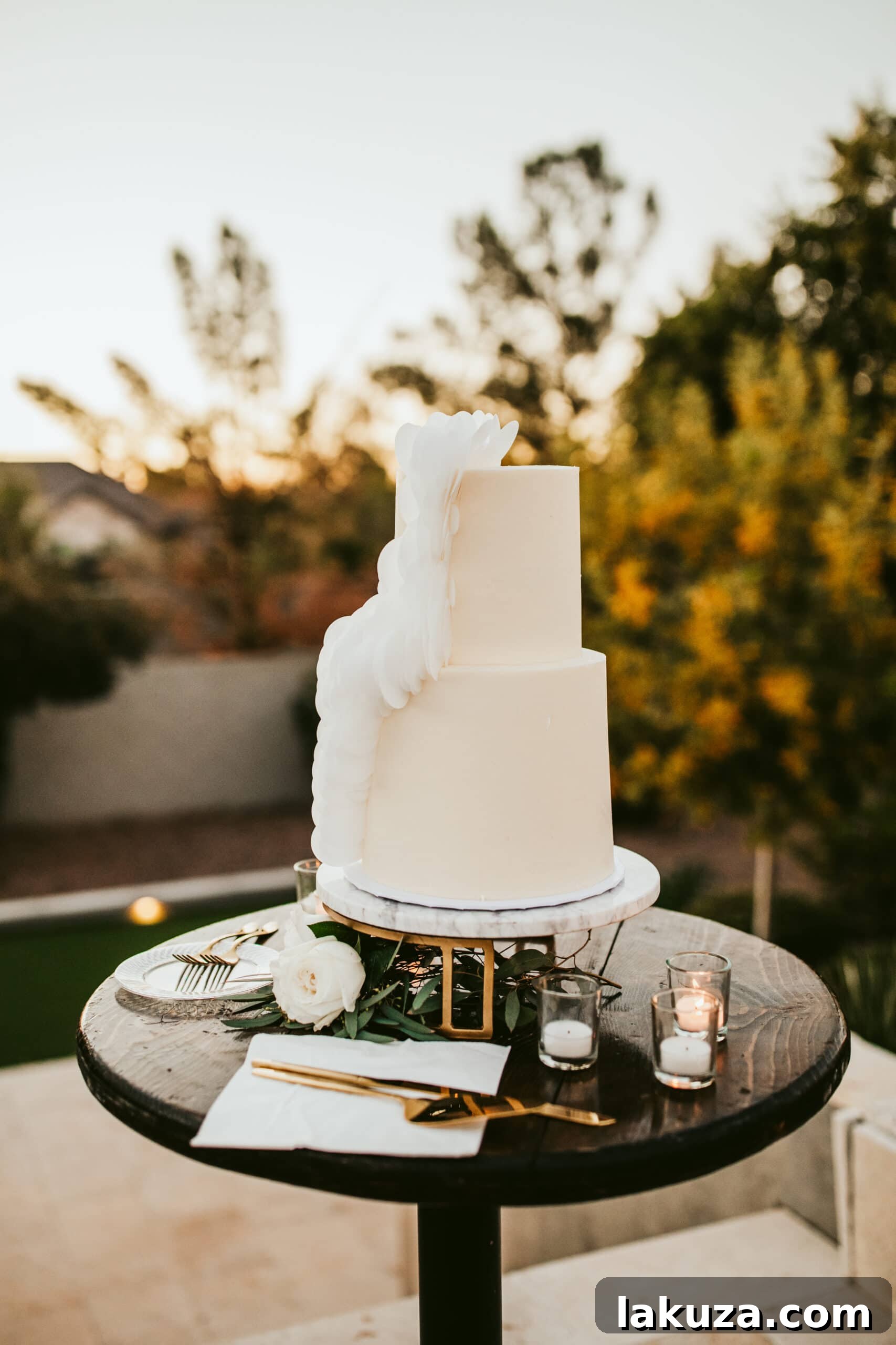 Wedding reception tables set with elegant food and floral centerpieces