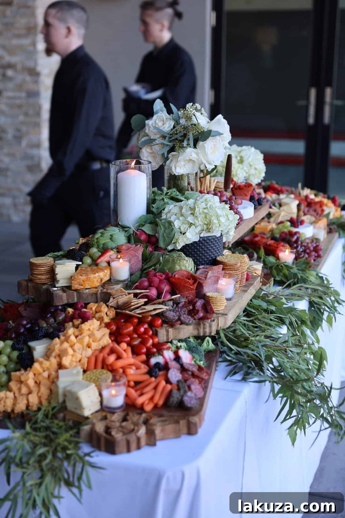 Gourmet hot chocolate bar with various toppings at wedding