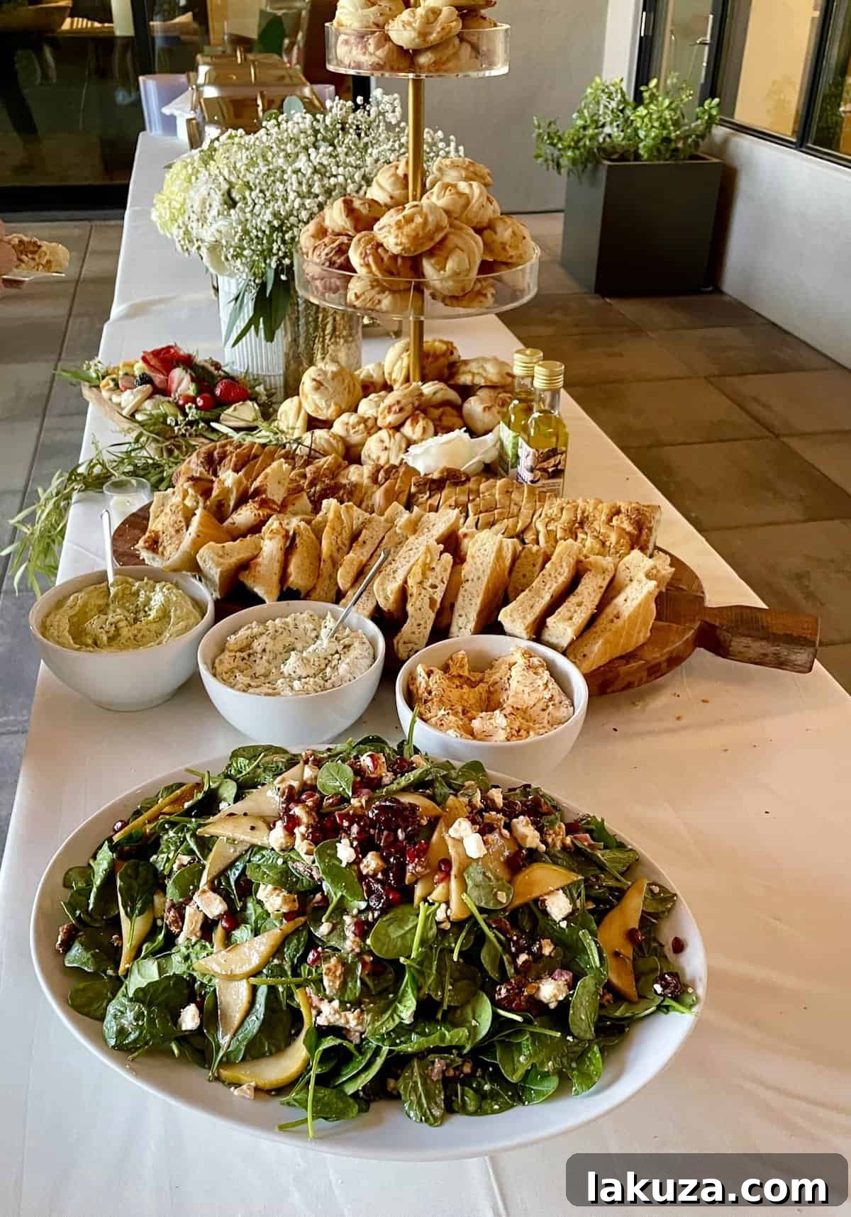 Beautifully decorated wedding dessert table with various treats
