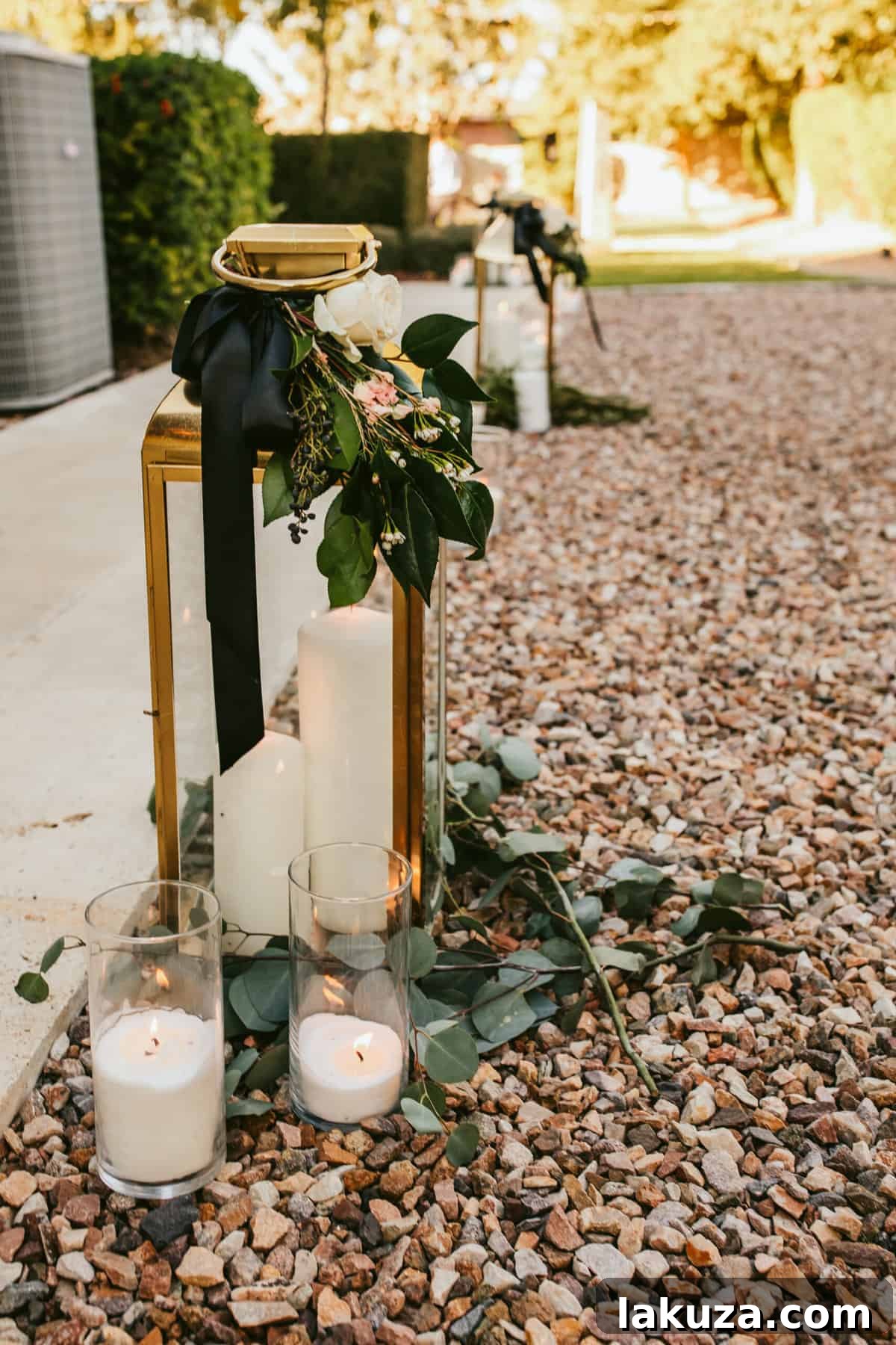 Close-up of wedding centerpiece with candles and roses