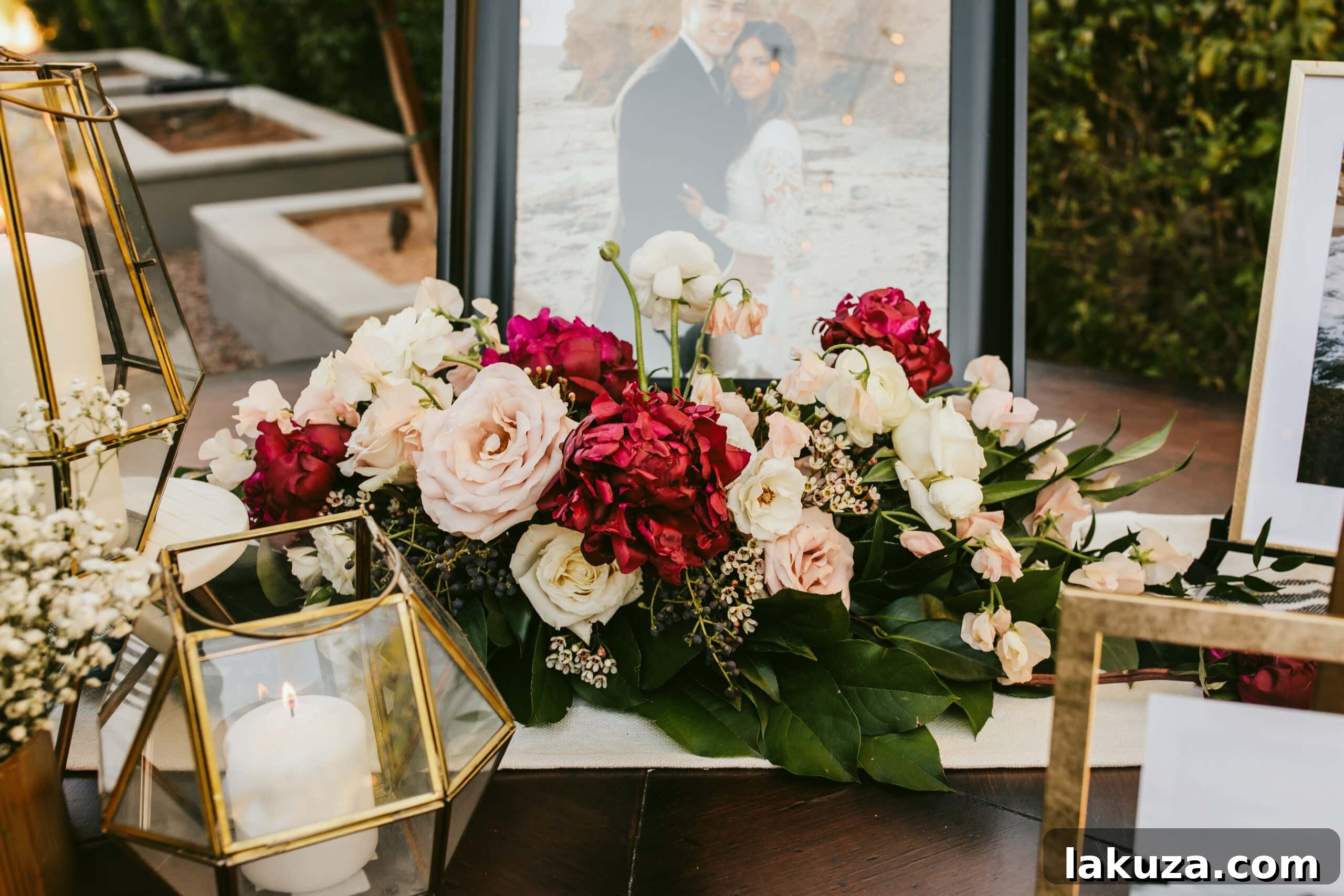 Wedding reception area with warm lighting and elegant table settings