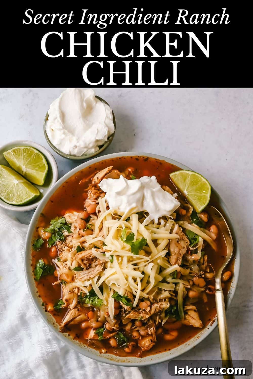 This quick and easy chicken chili is made in less than 30 minutes and filled with protein, good fats, and healthy carbs! This White Chicken Chili is a quick and easy soup recipe made with shredded chicken, onion, garlic, chili powder, green chilies, white beans, and ranch powder, and topped with cheese and sour cream.