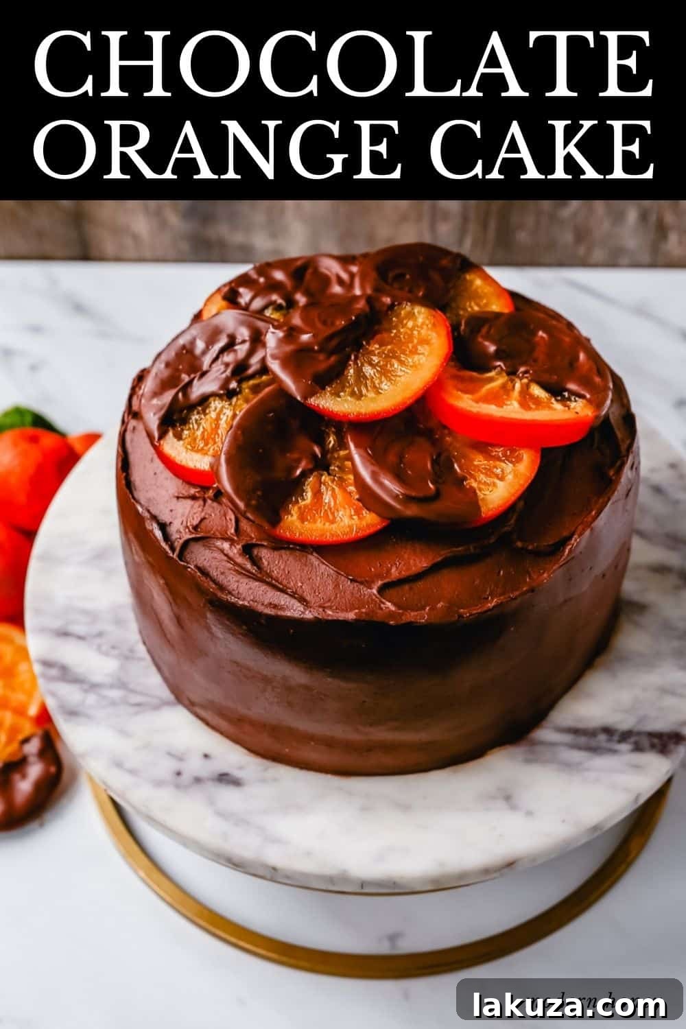 A beautiful, tall chocolate orange cake, perfectly frosted and ready to be served.