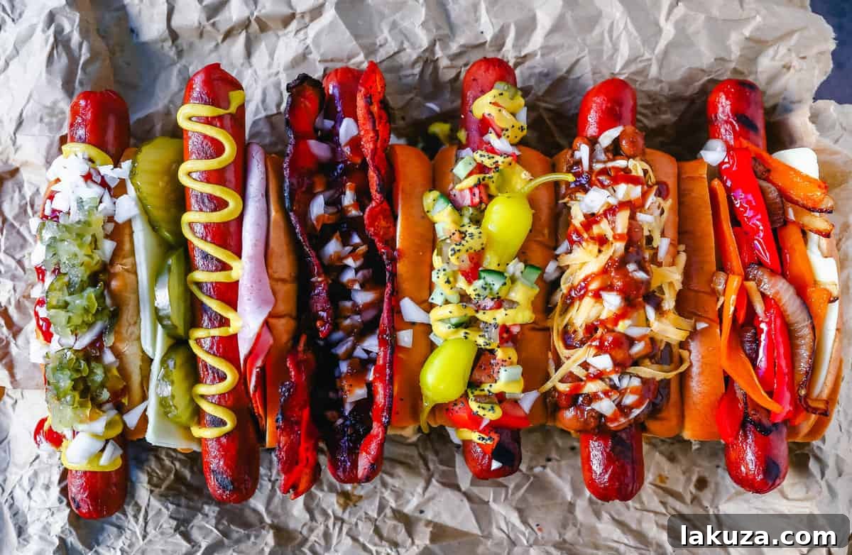 A vibrant platter of gourmet hot dogs with various toppings, showcasing a Chicago Dog, a Chili Dog, and a BBQ Bacon Dog.