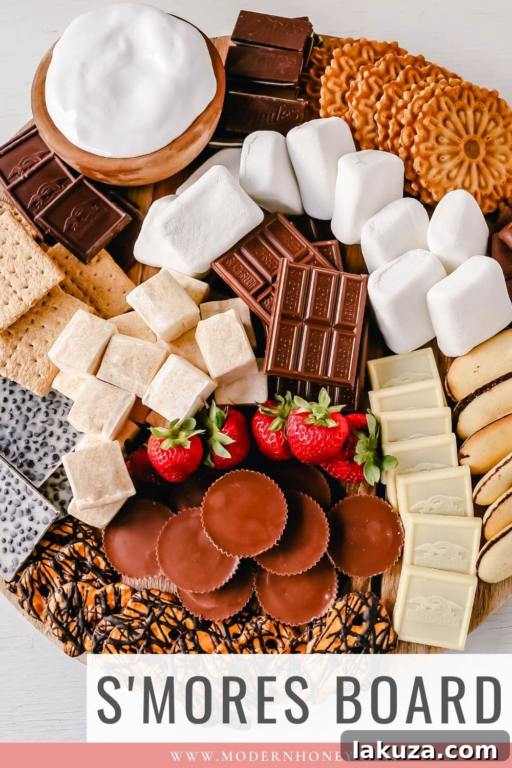 How to make the Ultimate S'mores. How to create a fun S'mores Board with all of the toppings. Perfect for campfires in the mountains, at the beach, or in your backyard! S'mores are the perfect customizable summer treat.