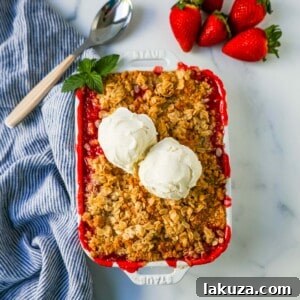 This Strawberry Crisp is made with fresh sweetened strawberries topped with a homemade buttery oat crumble topping. A Homemade Strawberry Crumble is an easy summer dessert.