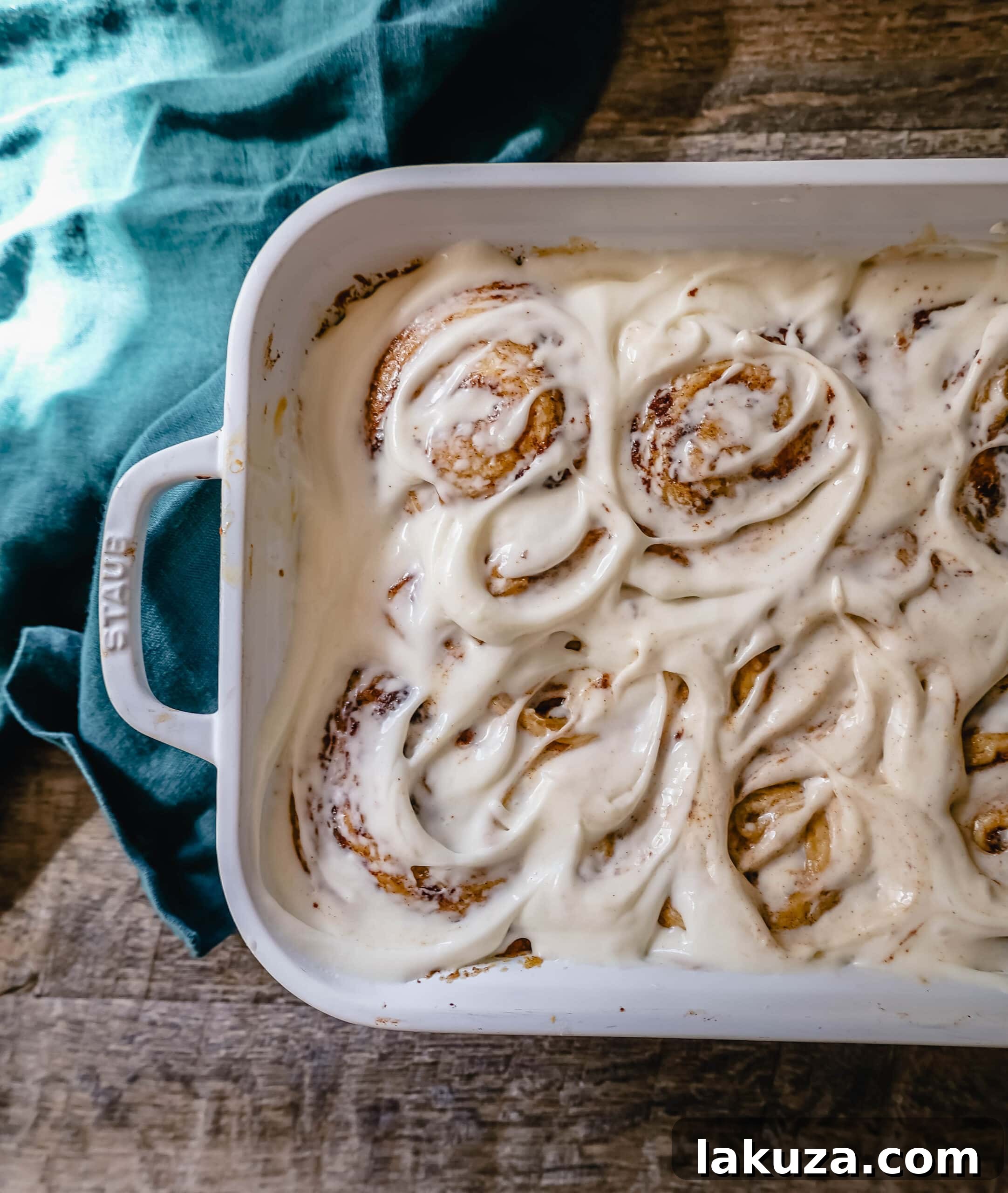 The famous, viral TikTok Cinnamon Rolls with heavy cream are even better than Cinnabon! These TikTok Cinnamon Rolls made with canned cinnamon rolls, a homemade buttery cinnamon drizzle, and a cream cheese frosting are the easiest cinnamon rolls you will ever make! 