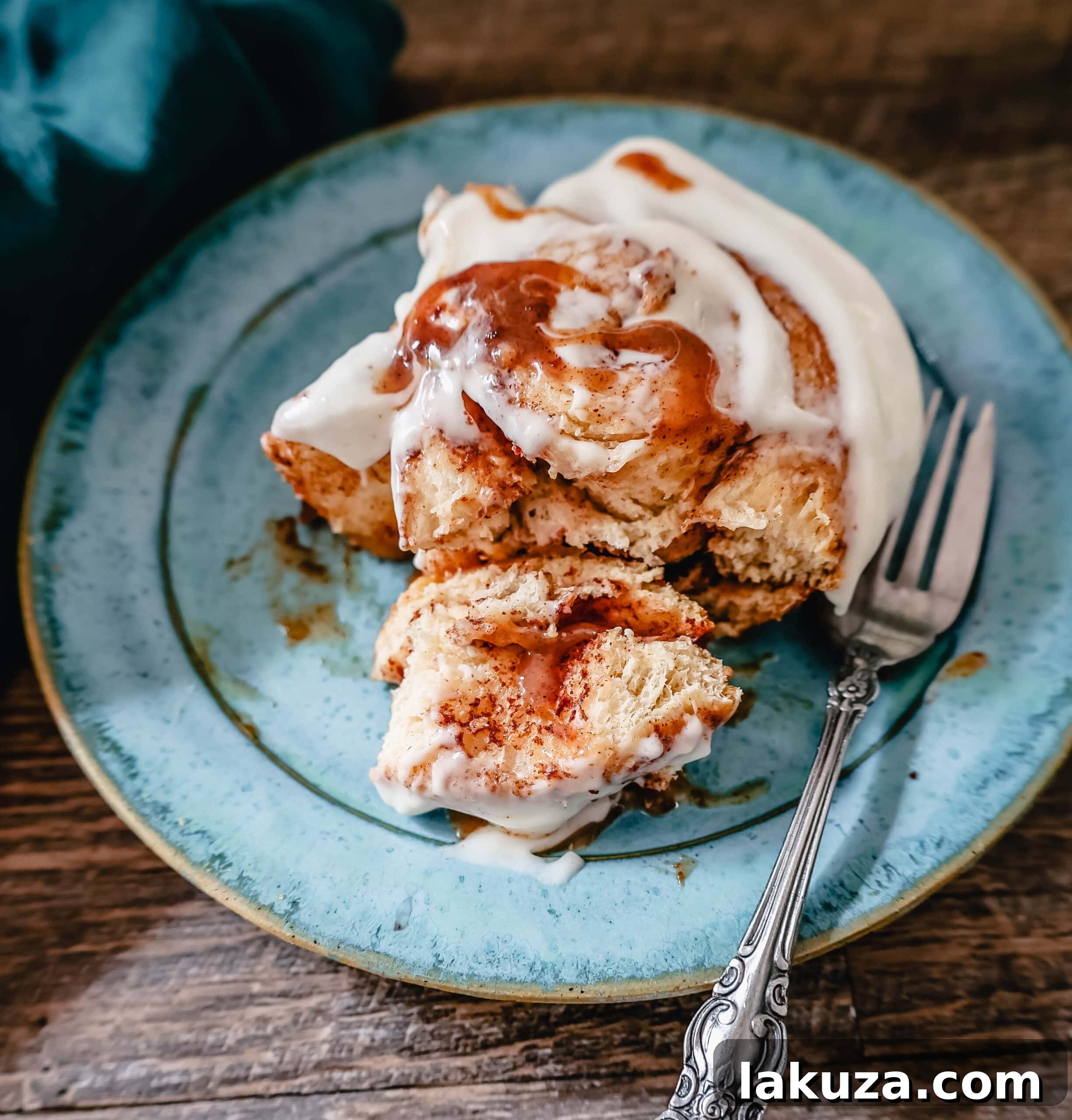 The famous, viral TikTok Cinnamon Rolls with heavy cream are even better than Cinnabon! These TikTok Cinnamon Rolls made with canned cinnamon rolls, a homemade buttery cinnamon drizzle, and a cream cheese frosting are the easiest cinnamon rolls you will ever make! 