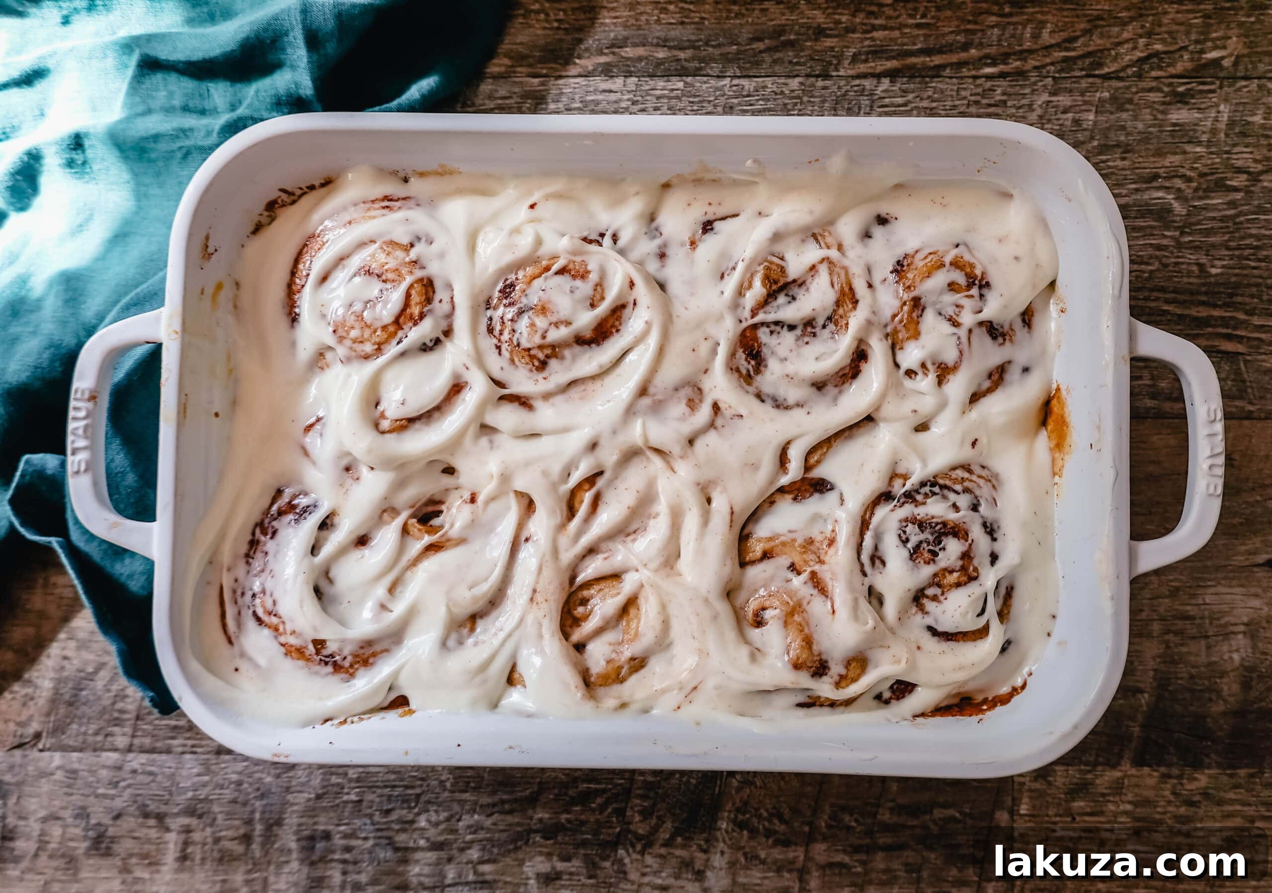 The famous, viral TikTok Cinnamon Rolls with heavy cream are even better than Cinnabon! These TikTok Cinnamon Rolls made with canned cinnamon rolls, a homemade buttery cinnamon drizzle, and a cream cheese frosting are the easiest cinnamon rolls you will ever make! 