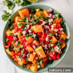 A vibrant bowl of fresh mango salsa, perfect for summer entertaining.