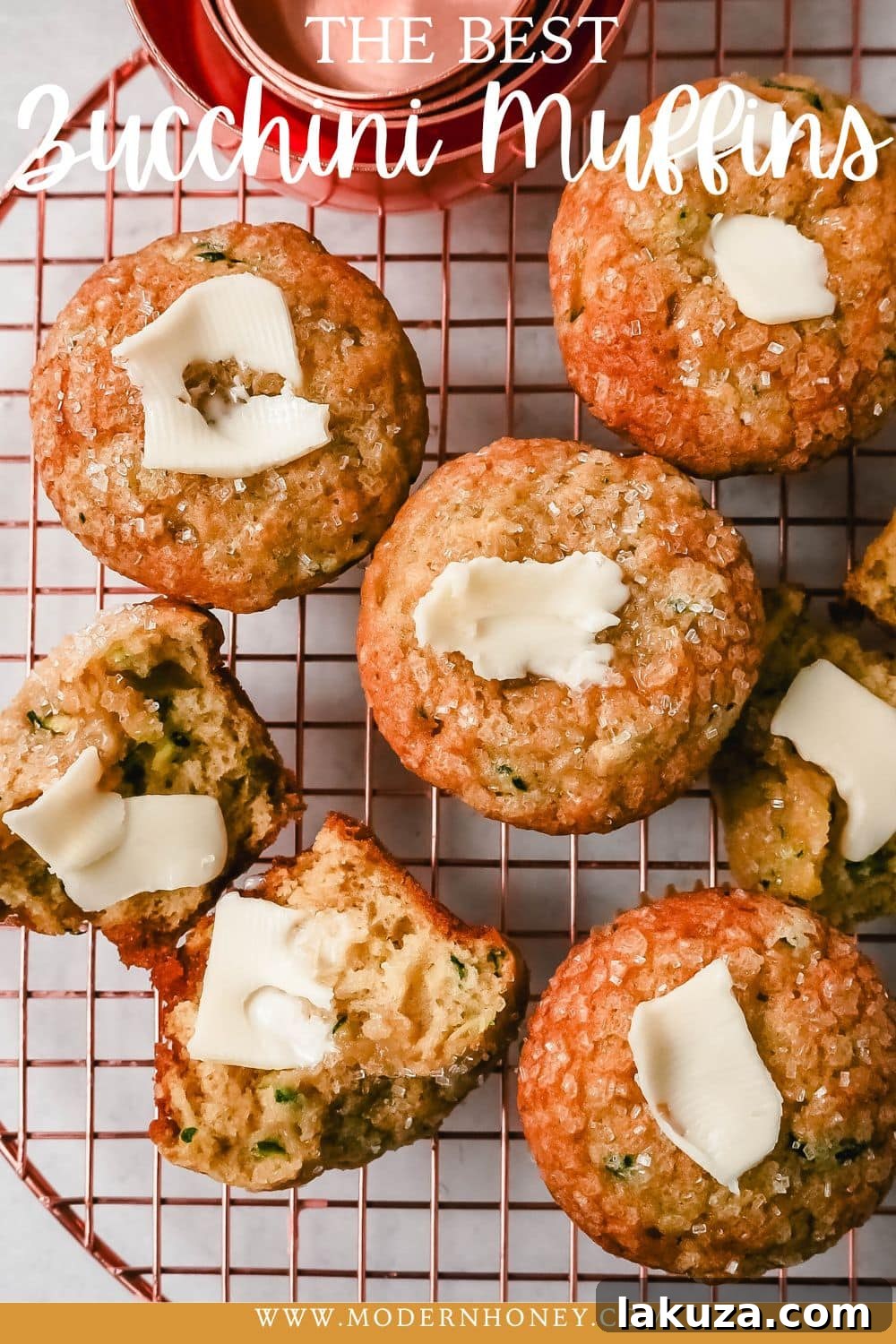 A beautiful stack of the best zucchini muffins, garnished with fresh zucchini slices, ready for serving.