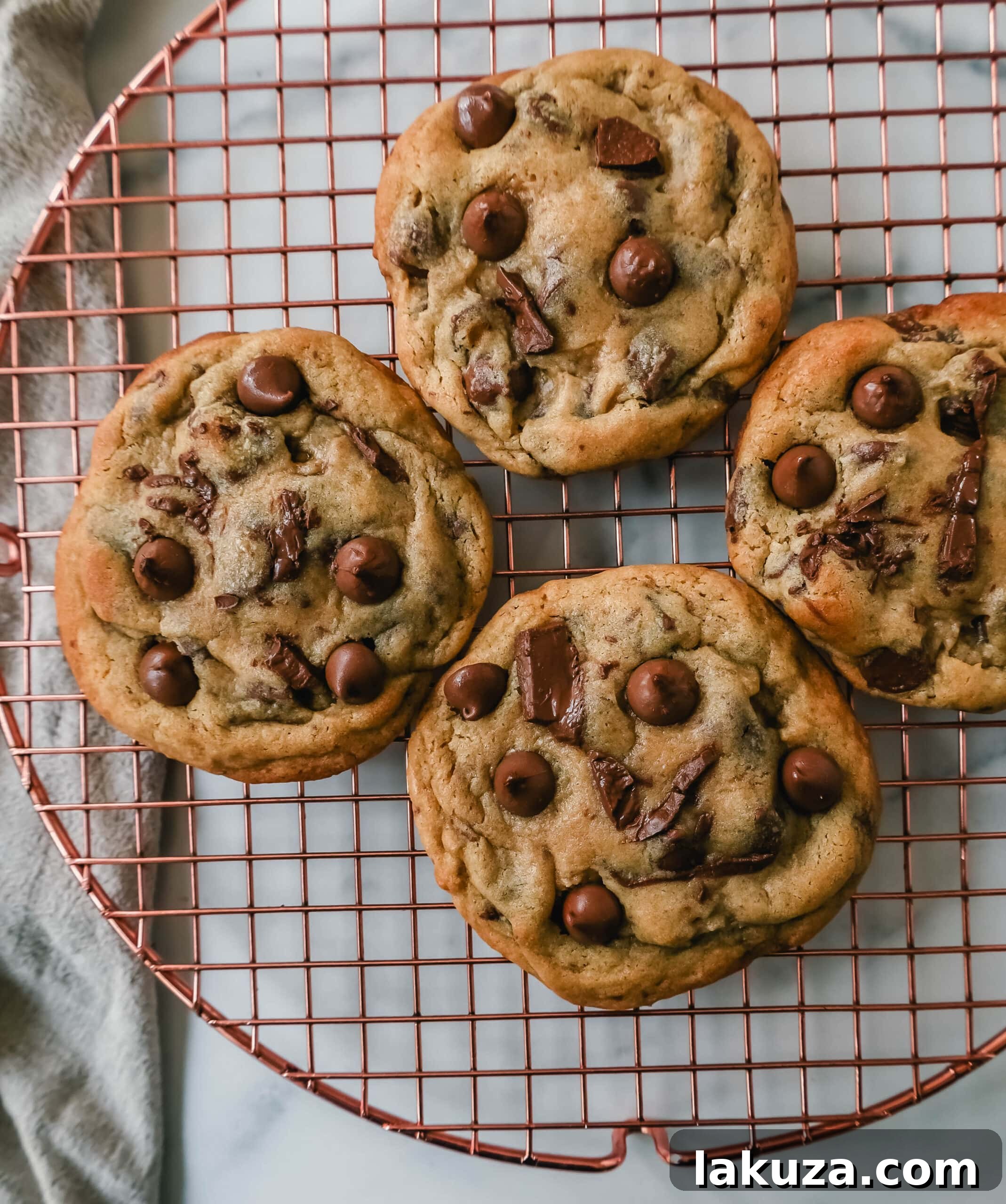 Irresistible Milk Chocolate Chip Delights 2 Thick, chewy milk chocolate chip cookies with gooey centers and crispy edges. The best milk chocolate chip cookie recipe.