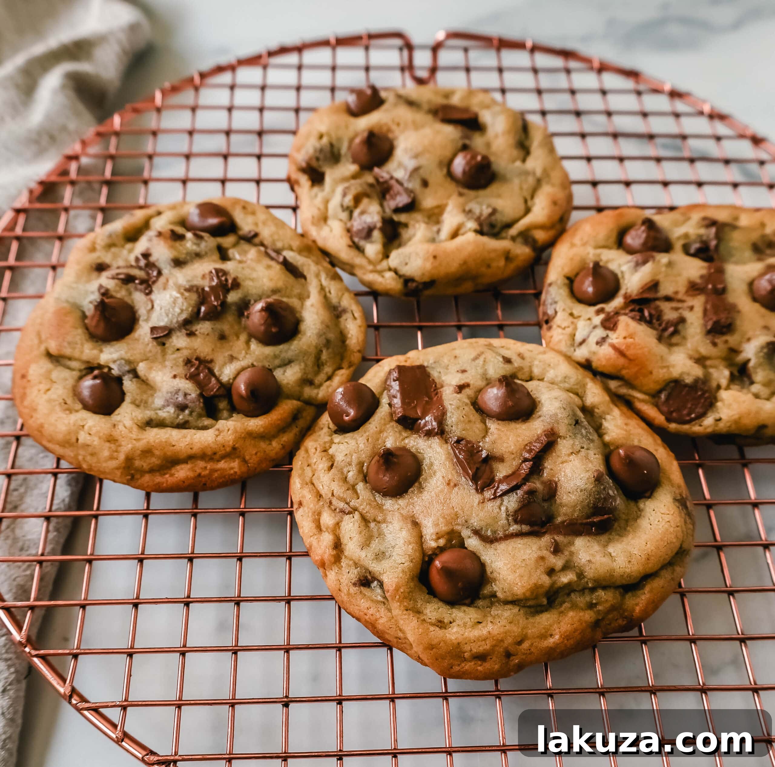 Irresistible Milk Chocolate Chip Delights 3 Close-up of a warm, gooey milk chocolate chip cookie, highlighting its chewy texture and melted chocolate. The ultimate milk chocolate cookie recipe.