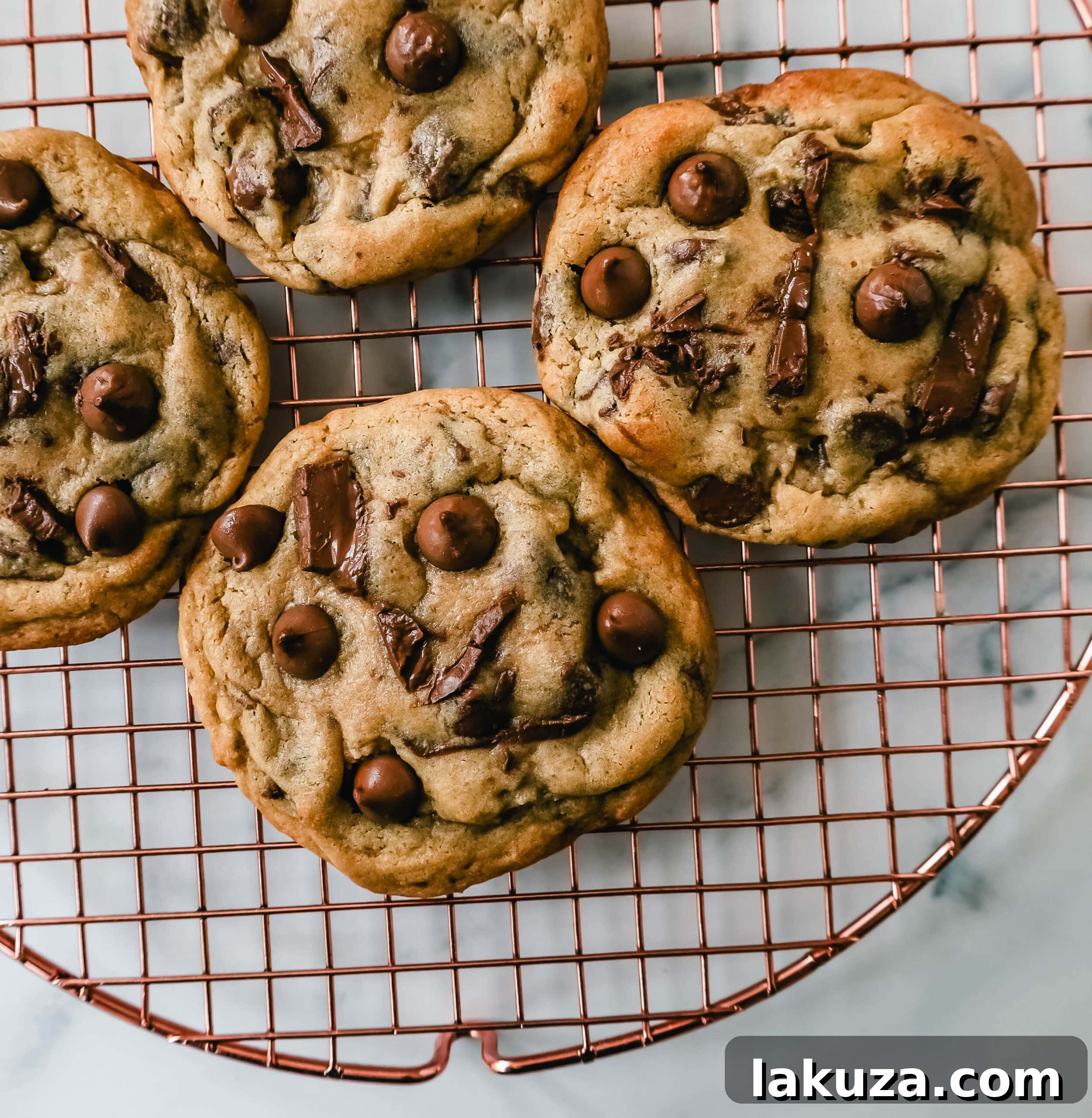 Irresistible Milk Chocolate Chip Delights 5 Stack of thick, chewy milk chocolate chip cookies, showcasing their rich color and inviting texture. Easy milk chocolate cookie recipe.