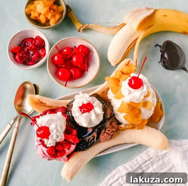 A classic Banana Split recipe made with fresh bananas, chocolate ice cream with hot fudge sauce, strawberry ice cream with strawberry sauce, vanilla ice cream with pineapple sauce, whipped cream, and cherry.