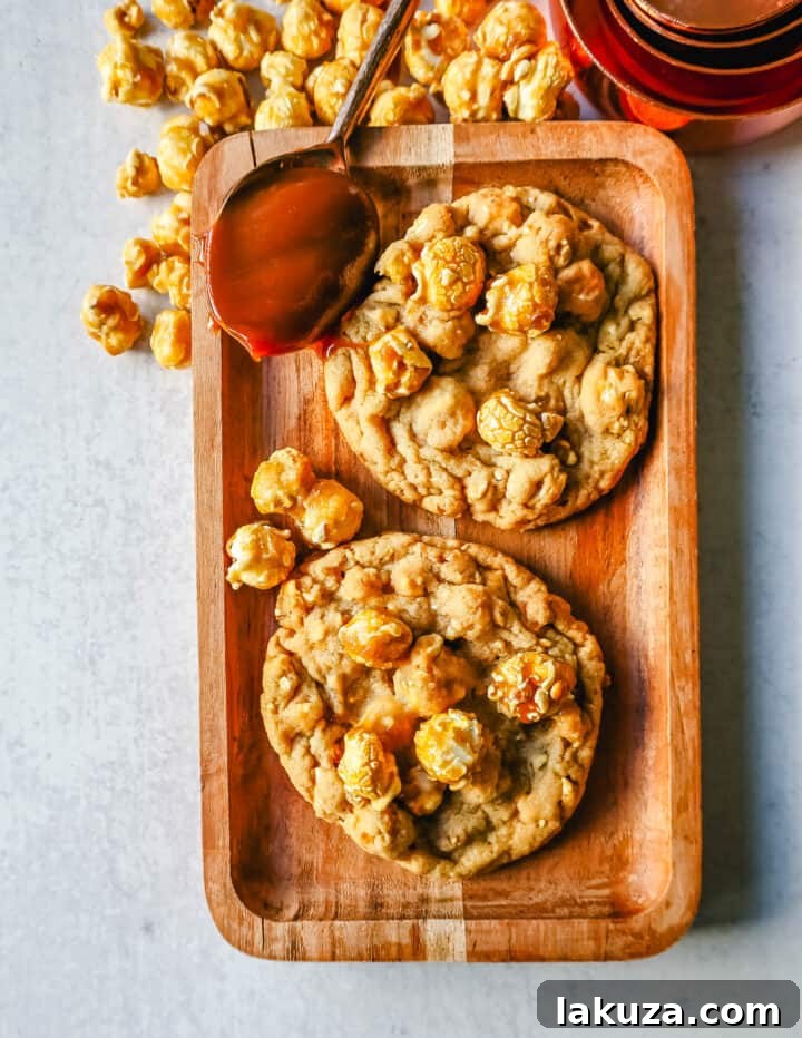 Sweet & Salty Popcorn Caramel Delights 4 A bowl of cookie dough studded with caramel popcorn pieces, ready for chilling before baking, highlighting the delicious texture.