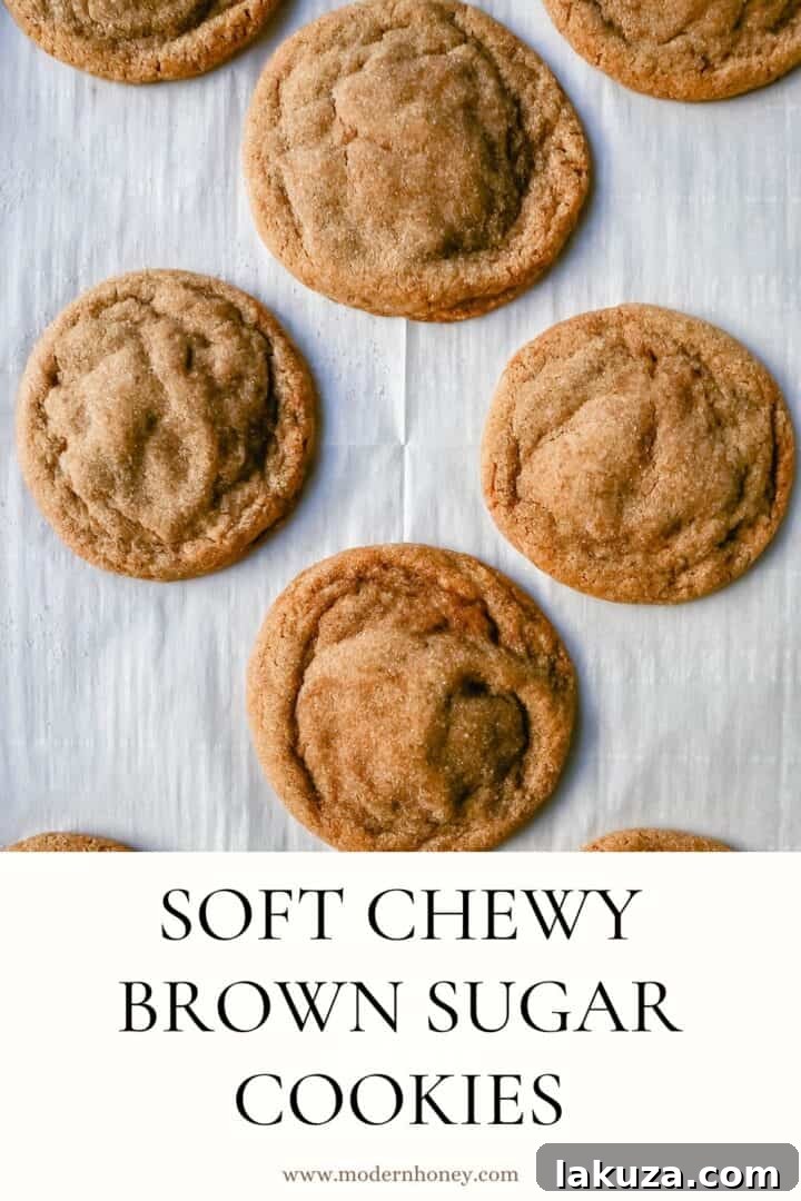 A close-up of a stack of soft brown sugar cookies, showing their warm, inviting color and tender texture.