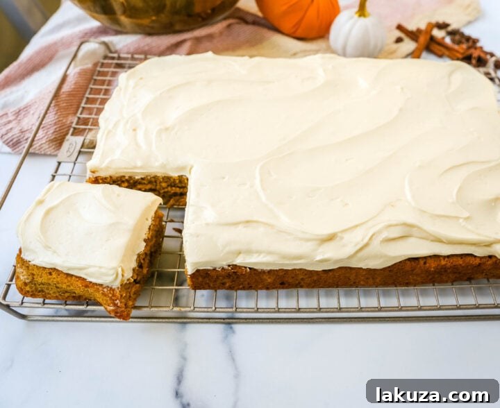 Spiced Pumpkin Bars with Tangy Cream Cheese Frosting 6 Perfectly baked Pumpkin Bars ready for frosting