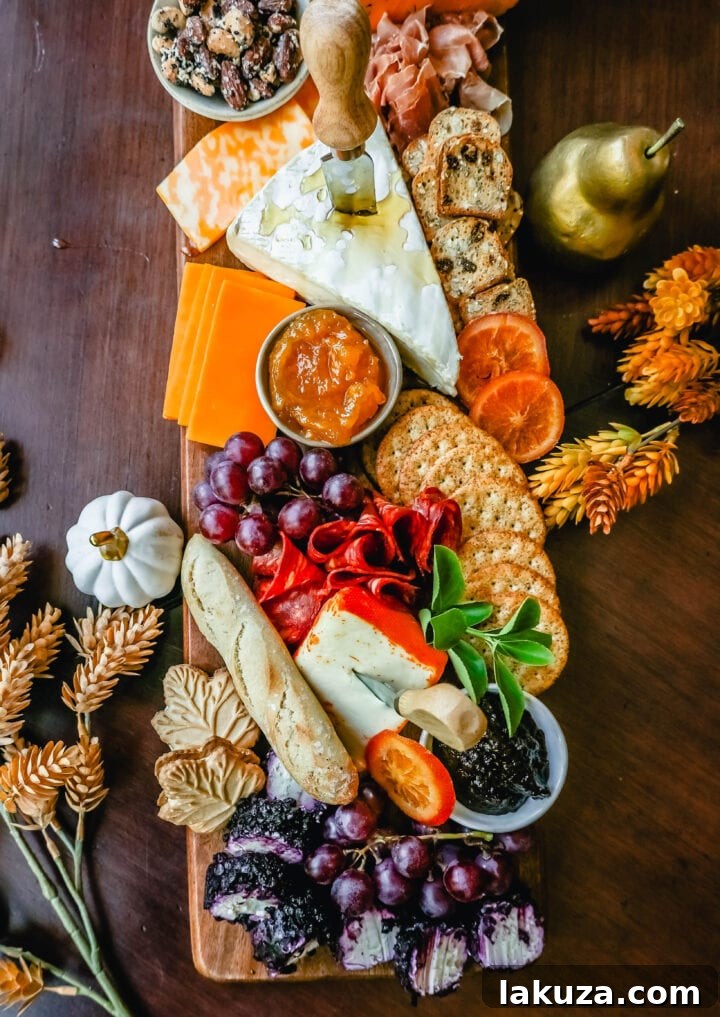 Autumn Harvest Charcuterie Spread 7 Festive Charcuterie Board perfect to celebrate Thanksgiving or Friendsgiving with friends and family. How to pick out the perfect meats, cheeses, fruits, jams, crackers, and dips for your Fall charcuterie spread. Tips and tricks for making the best charcuterie board.