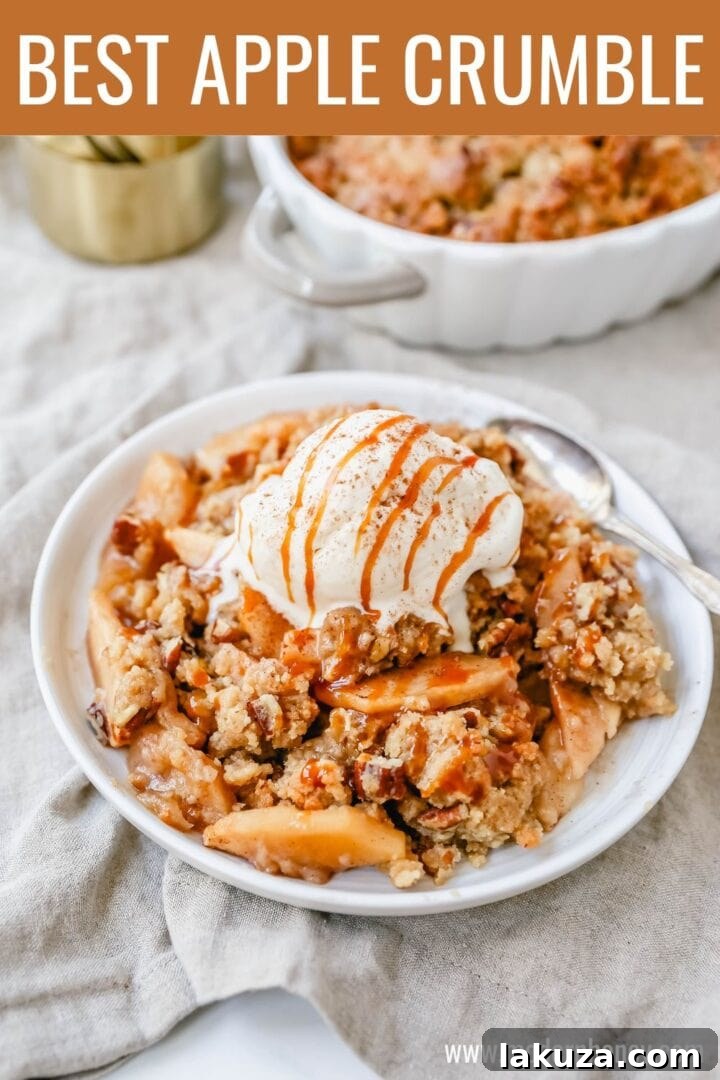 Simple Apple Crumble Bliss 7 Homemade Apple Crumble Recipe made with fresh apples tossed in cinnamon sugar and topped with a brown sugar crumble made with butter, pecans, brown sugar, and flour. This apple crumble is baked until bubbly and topped with vanilla ice cream. An easy apple dessert!