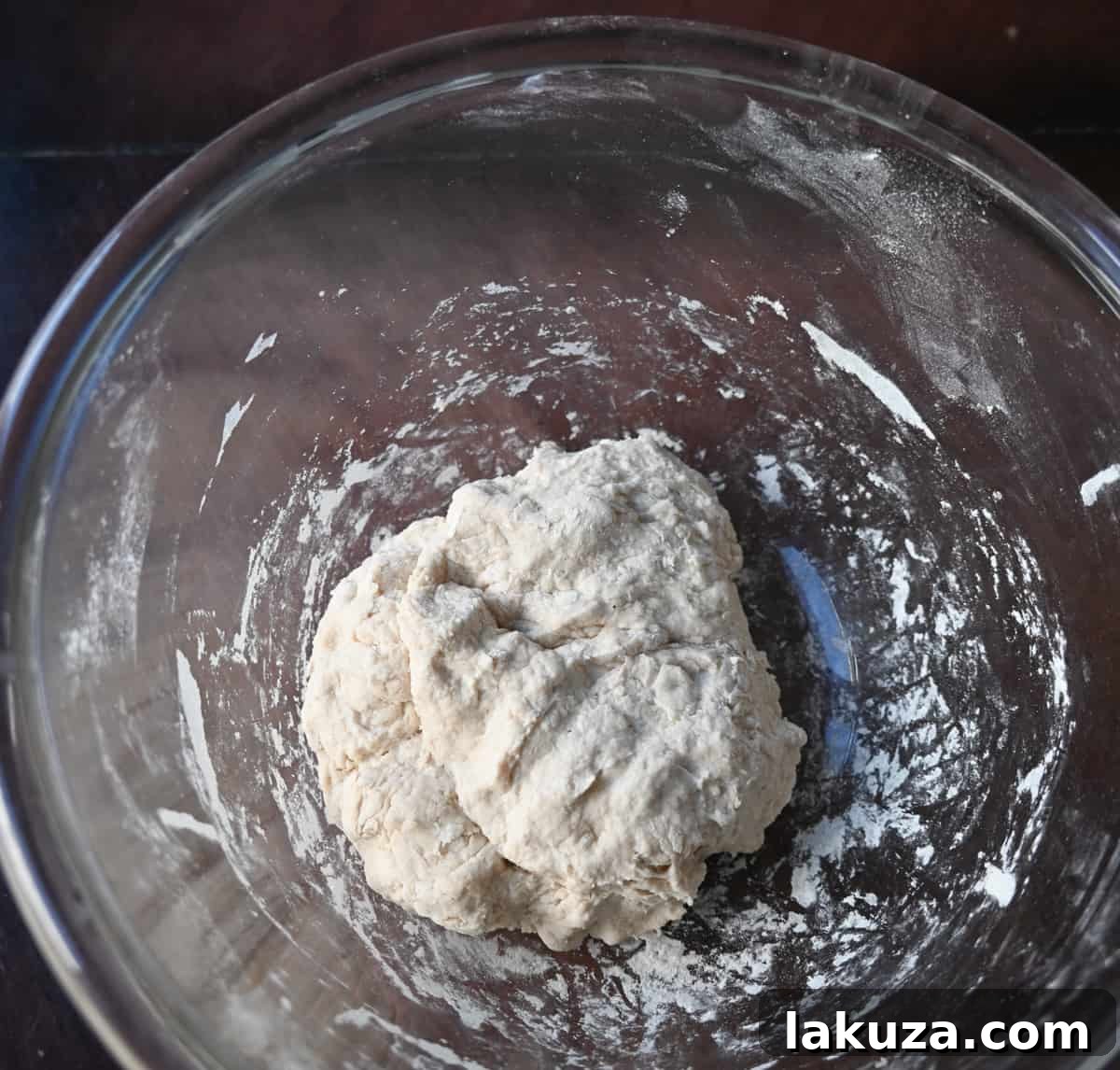 Effortless Overnight Artisan Loaf 11 The shaggy, wet no-knead dough mixture in a bowl after all ingredients are combined, ready for its long rise.