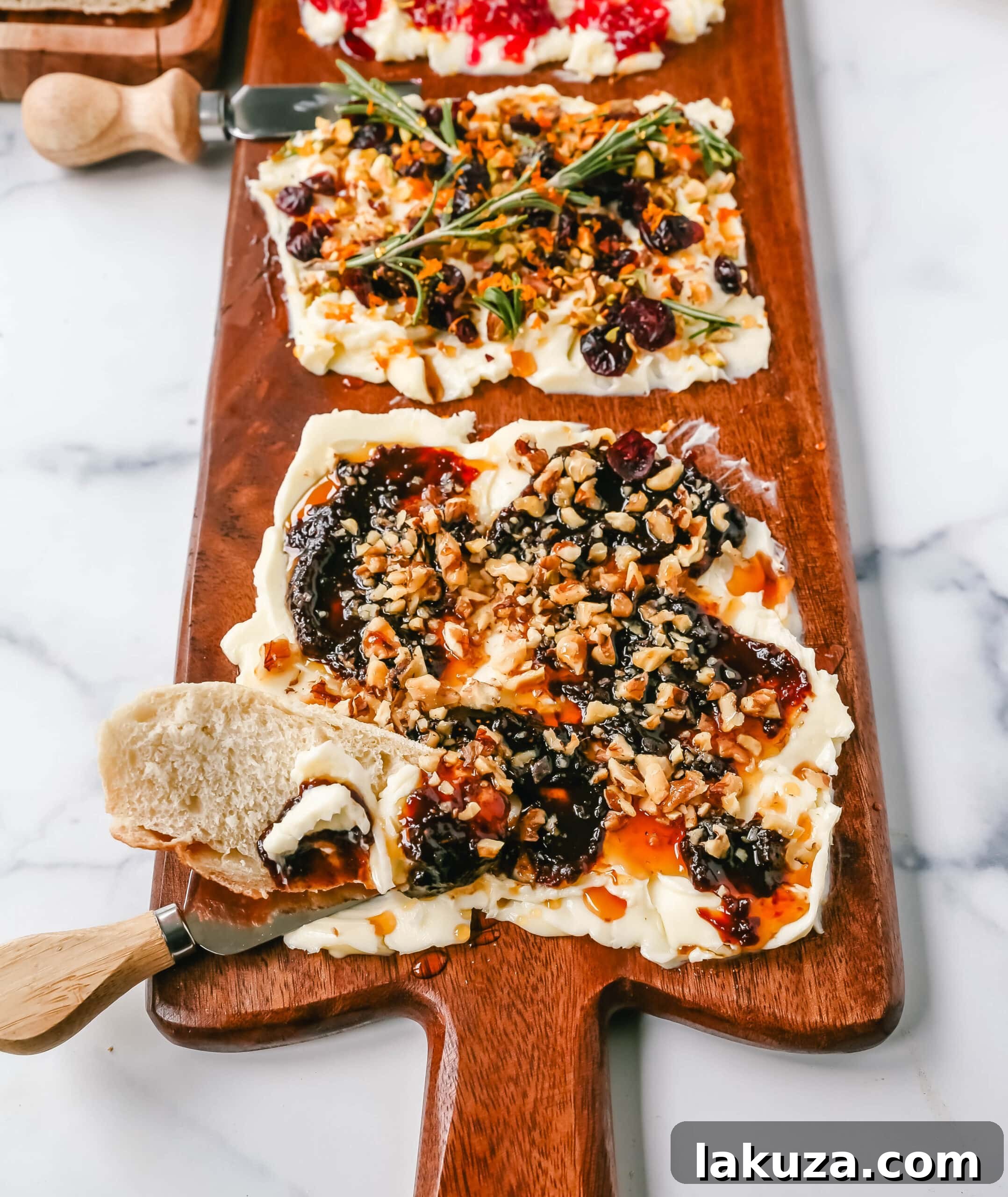 Creamy Culinary Canvas 6 A vibrant sweet Butter Board section featuring honey, sliced almonds, and juicy pomegranate seeds, highlighting the diverse topping possibilities.