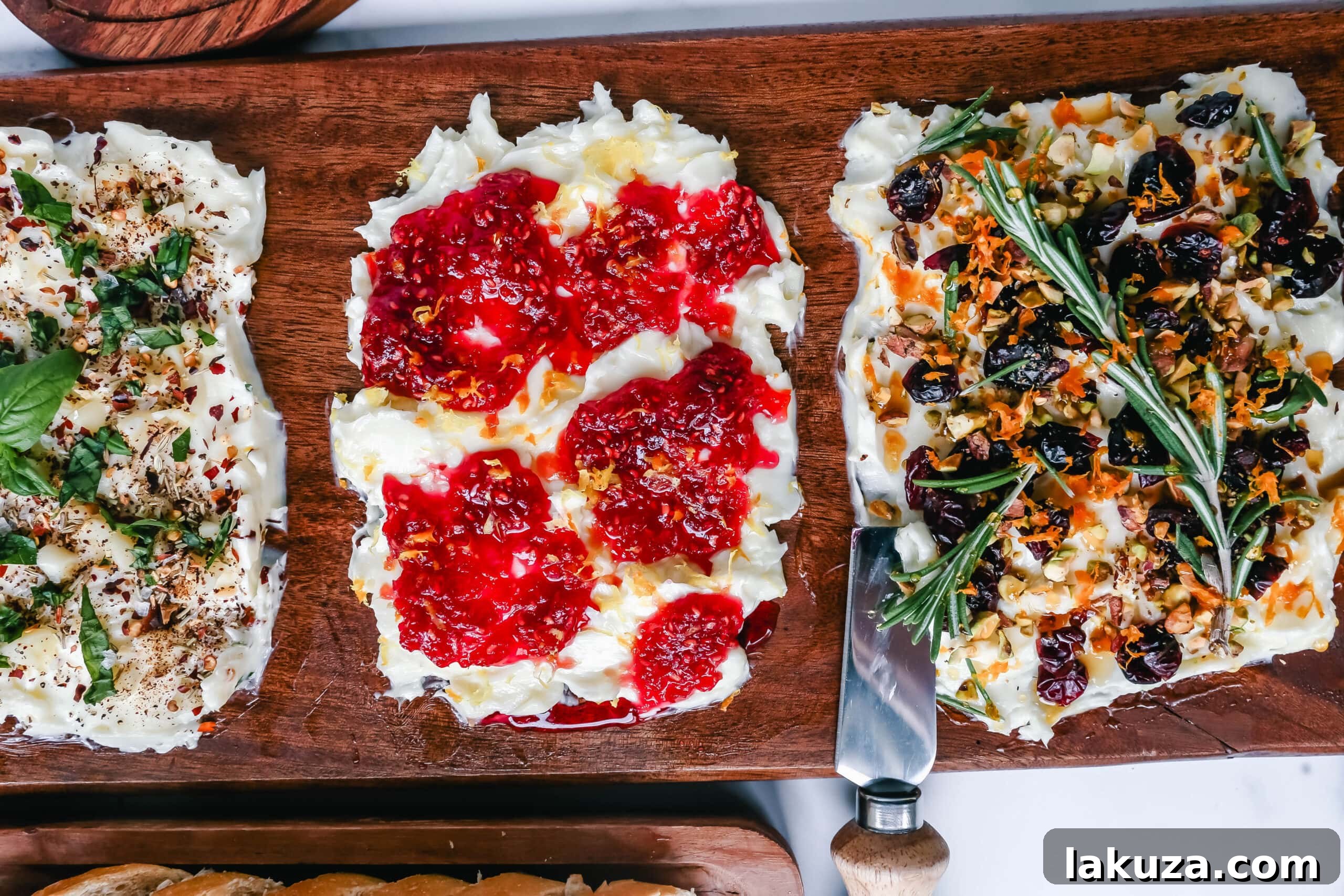 Creamy Culinary Canvas 7 A festive Butter Board section featuring fresh herbs, red chili flakes, and toasted nuts, demonstrating rich textures and flavors for a holiday gathering.