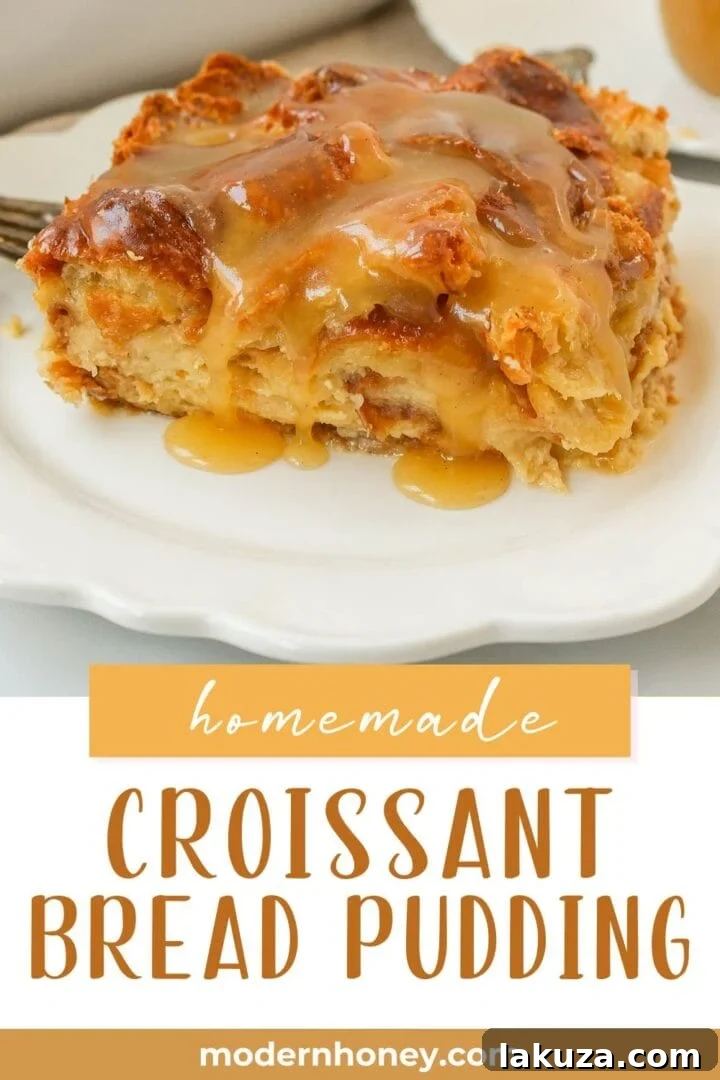 Heavenly Croissant Bake 5 A top-down view of the freshly baked Croissant Bread Pudding in a baking dish, generously topped with creamy vanilla sauce, ready to be served.