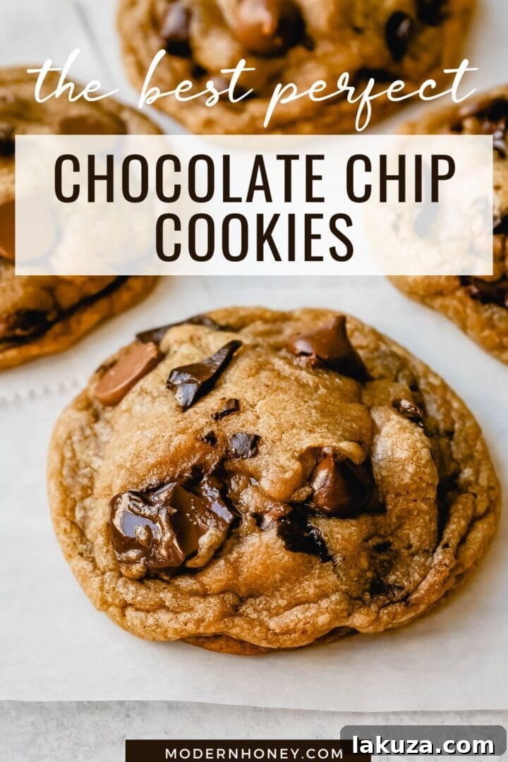 Irresistible Chocolate Chip Cookies 11 A rustic scene of baked chocolate chip cookies and milk, inviting indulgence.