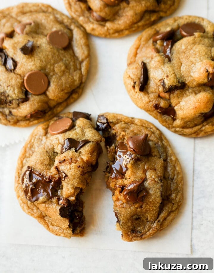 Irresistible Chocolate Chip Cookies 10 A close-up shot of an irresistible chocolate chip cookie, showcasing its golden edge and soft, molten center with visible chocolate pools.
