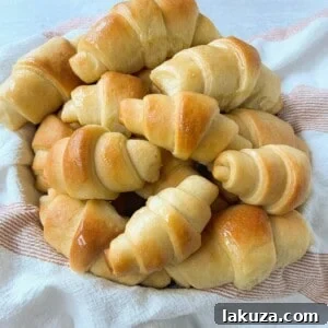 Golden Flaky Crescents 12 Delicious homemade crescent rolls, buttery, light, and fluffy.