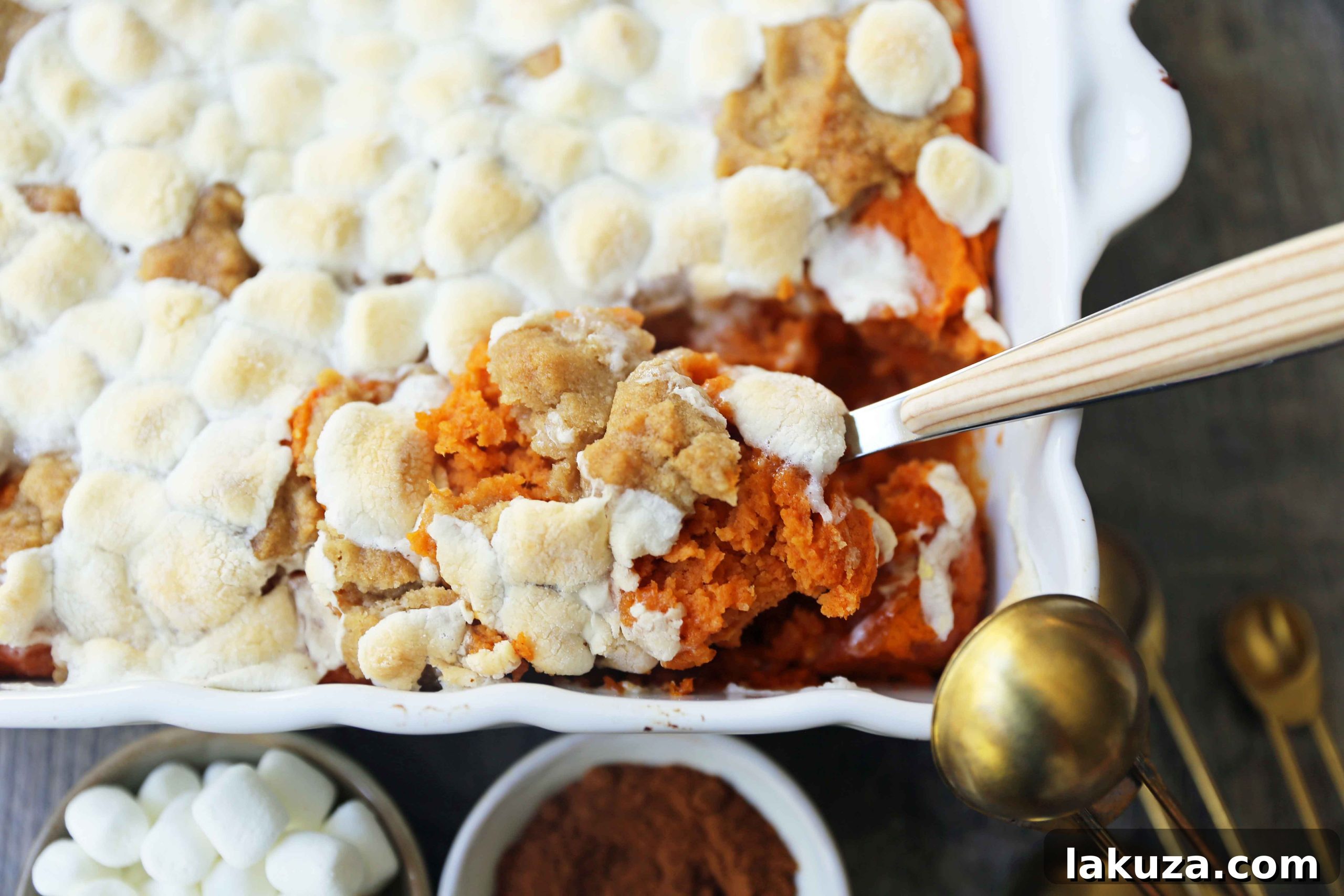 Sweet Potato Casserole with Marshmallows and Streusel: Savory and creamy sweet potatoes topped with toasted marshmallows and brown sugar streusel, a Thanksgiving staple.