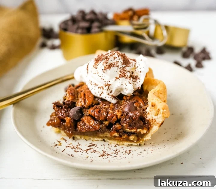 Chocolate Pecan Pie: Homemade pecan pie with chocolate chips in a buttery, flaky pie crust, rich and delicious.