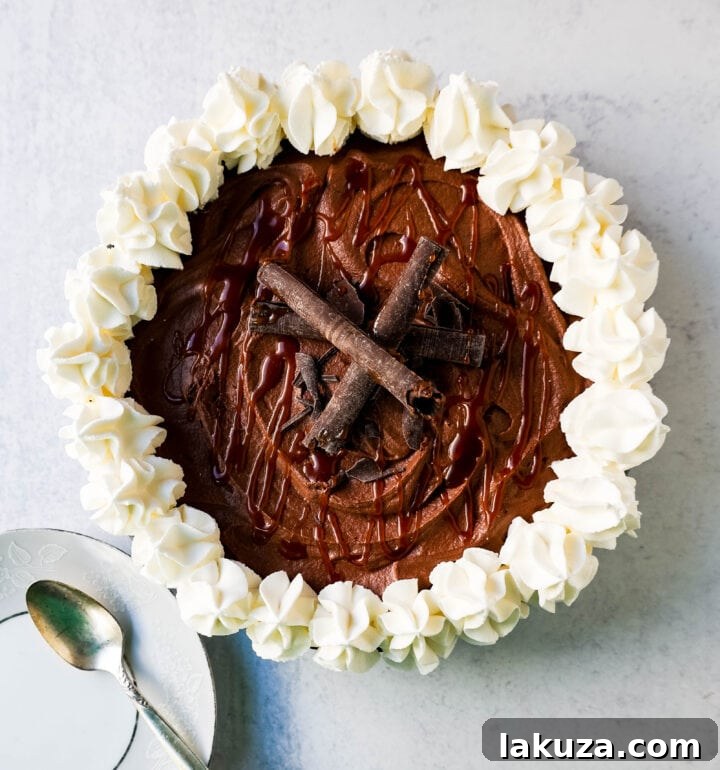 Close-up of Mexican Chocolate Cream Pie showing the creamy filling and a perfect slice ready to be served, highlighting the texture and topping.